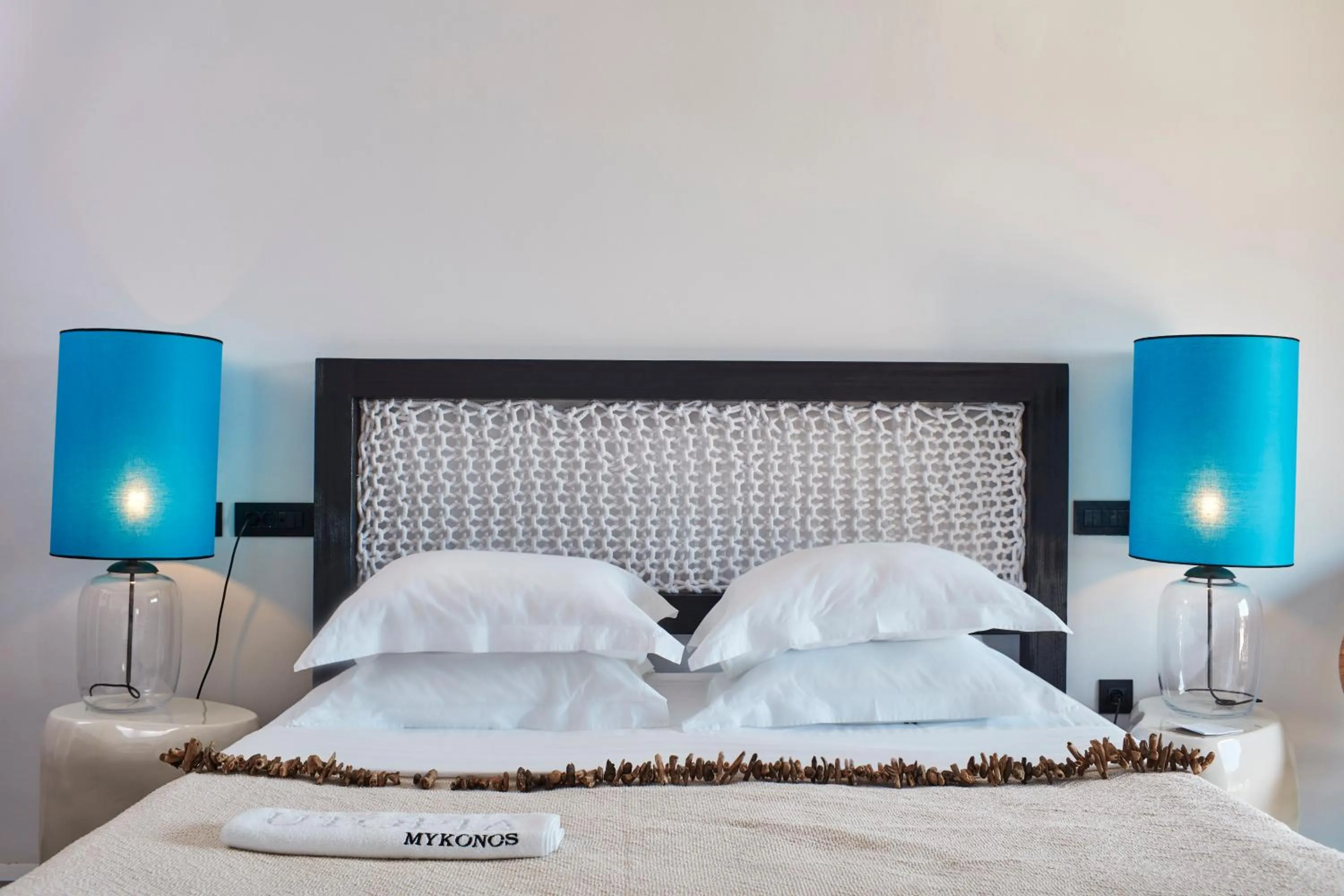 Decorative detail, Bed in Myconian Utopia Relais & Chateaux