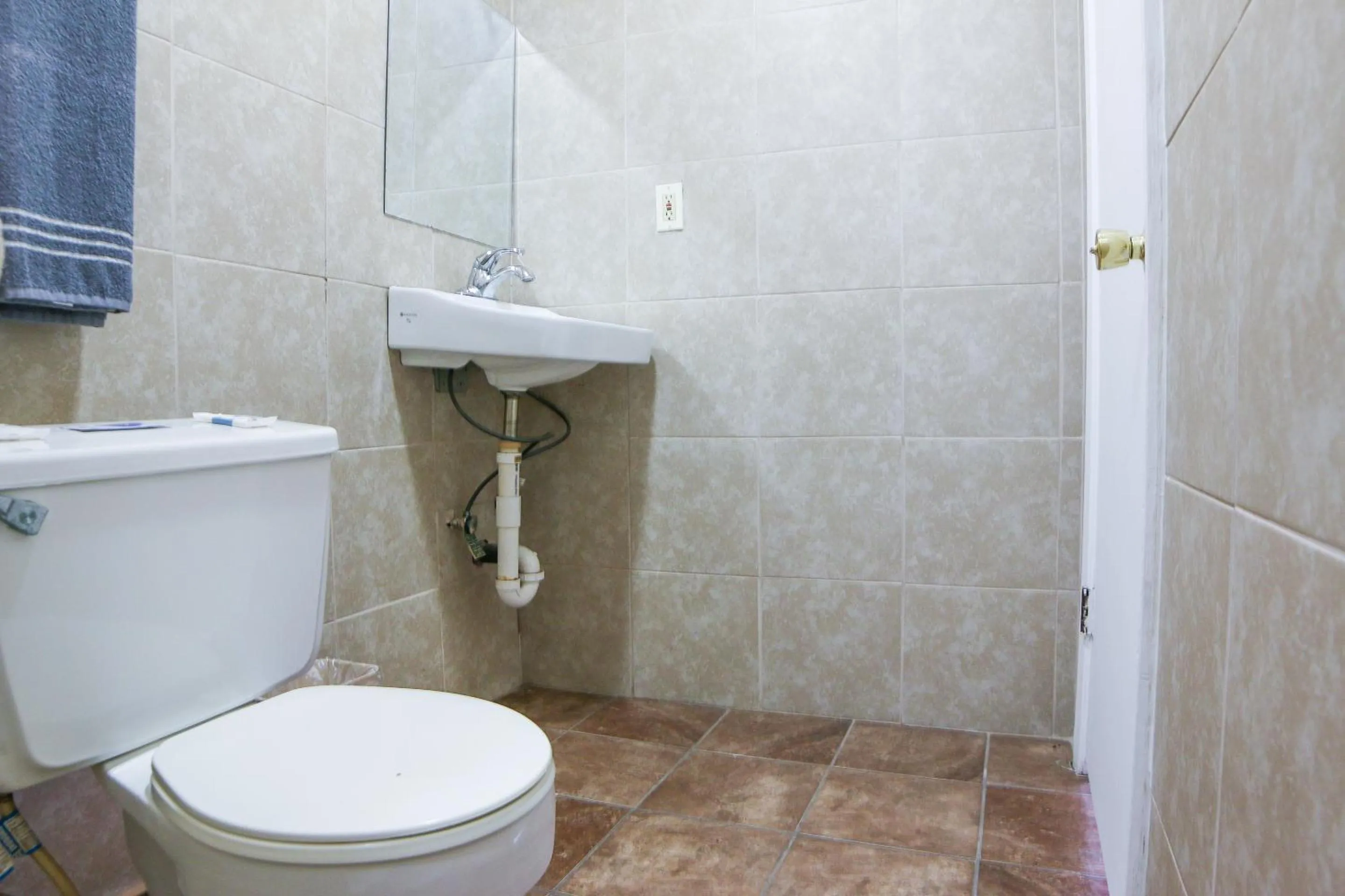 Bathroom in Economy Inn By OYO Lockport near Houma