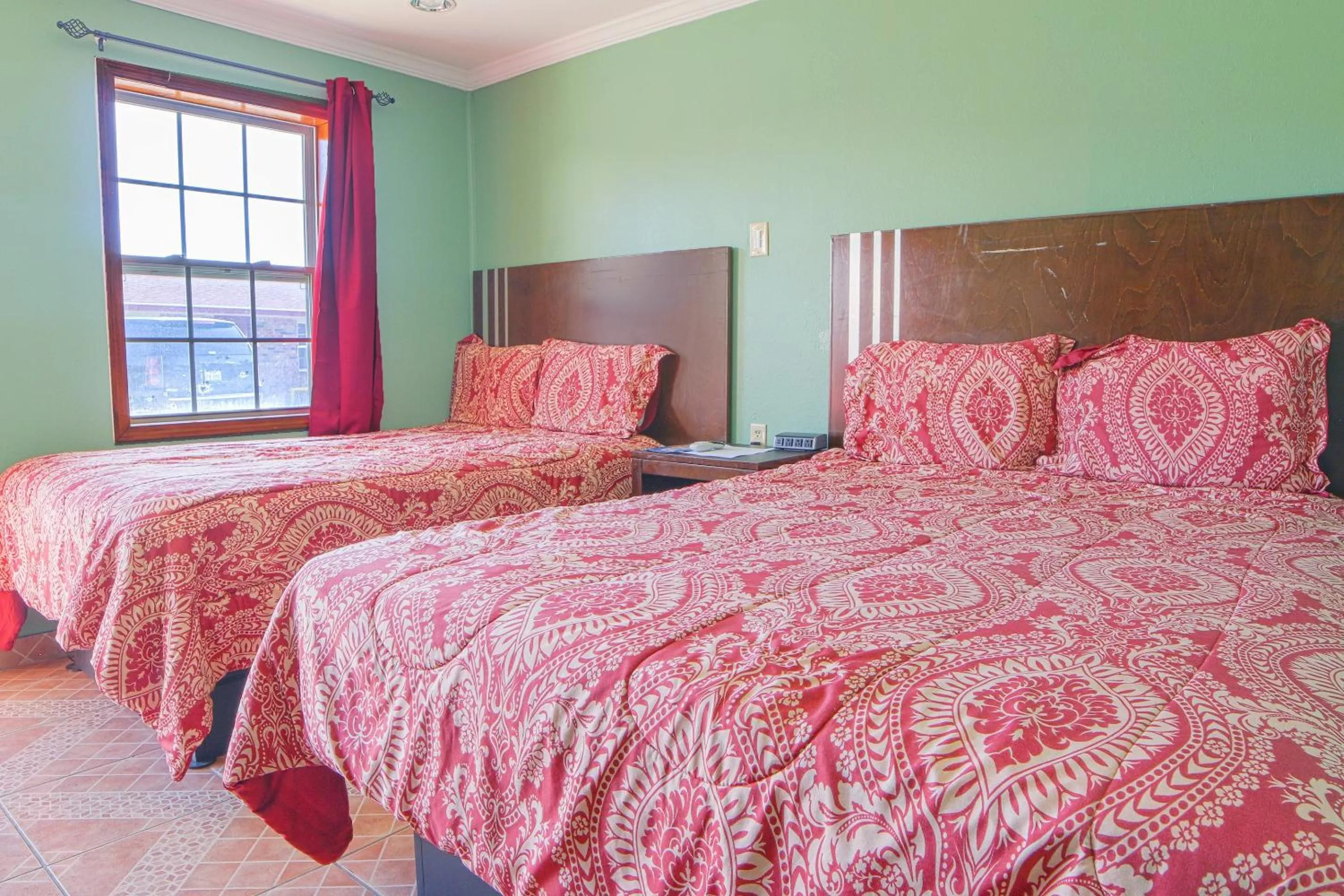 Bedroom, Bed in Economy Inn By OYO Lockport near Houma