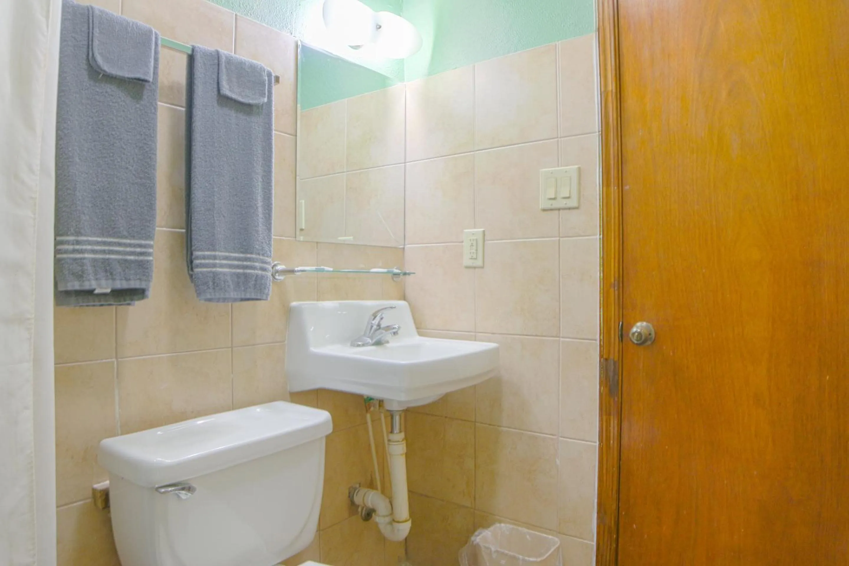 Bathroom in Economy Inn By OYO Lockport near Houma