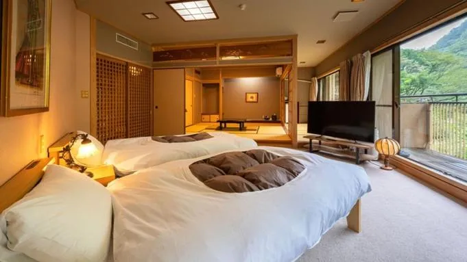 Communal lounge/ TV room, Bed in Hakkei