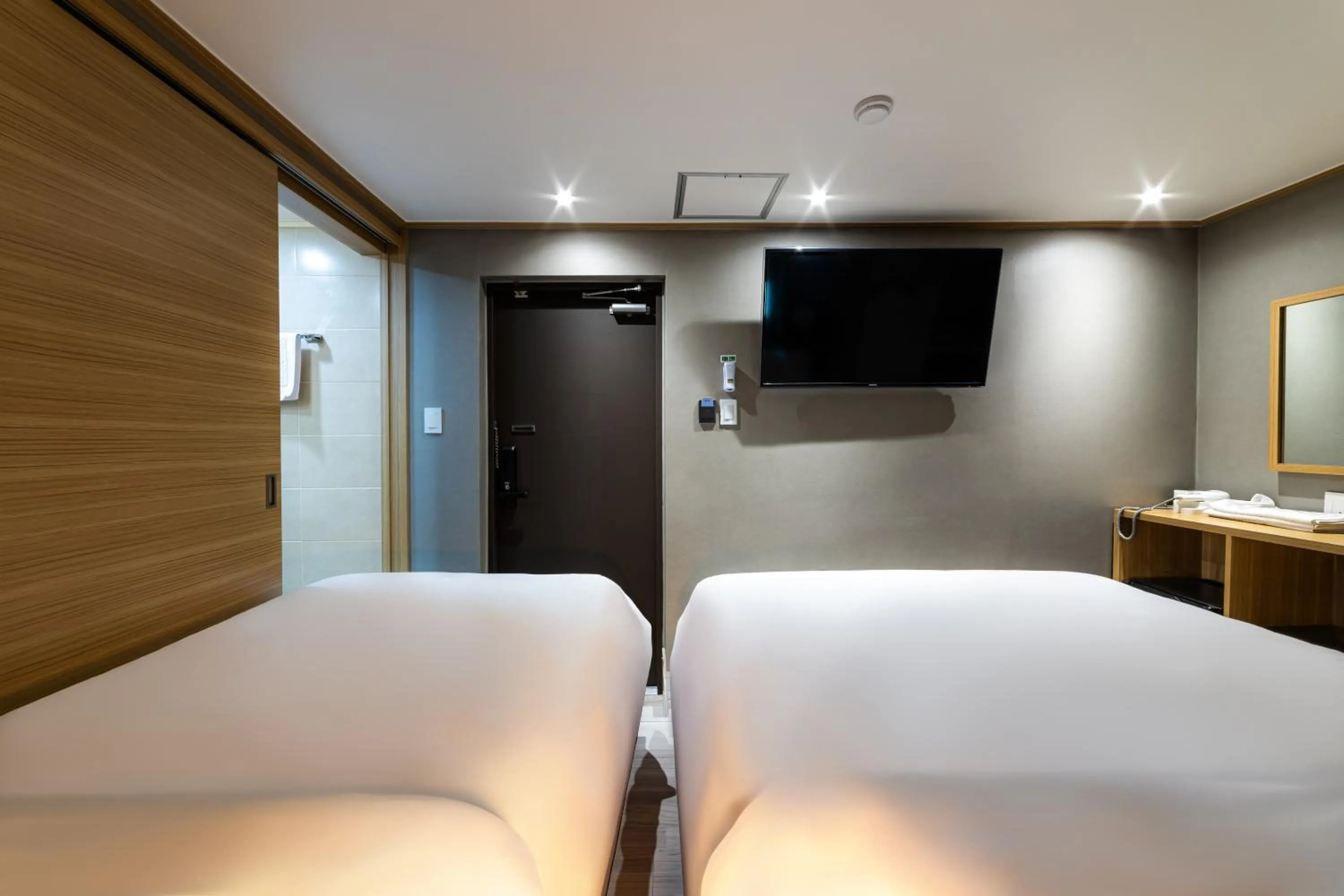 Bed in About Stay Seoul