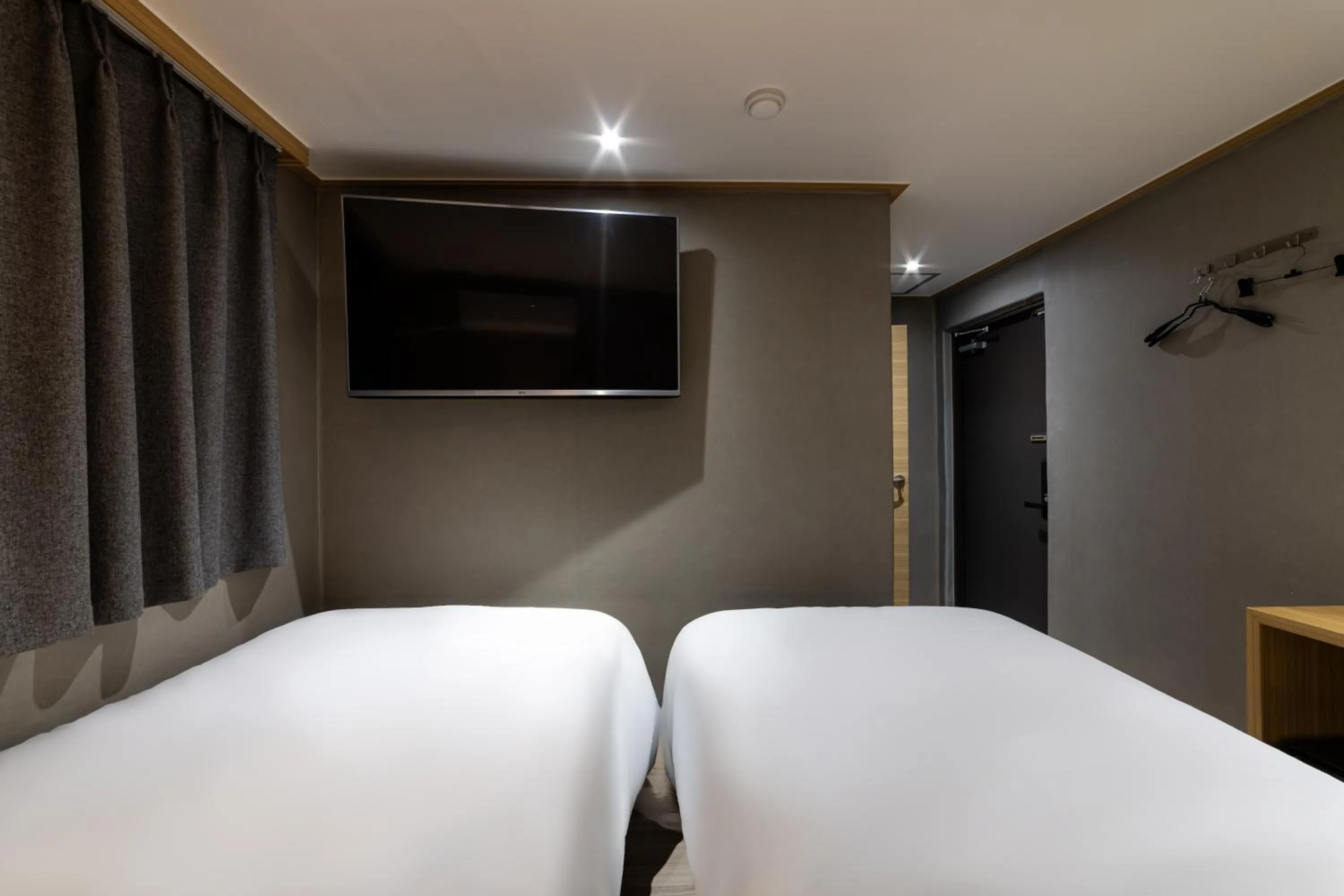 Bed in About Stay Seoul