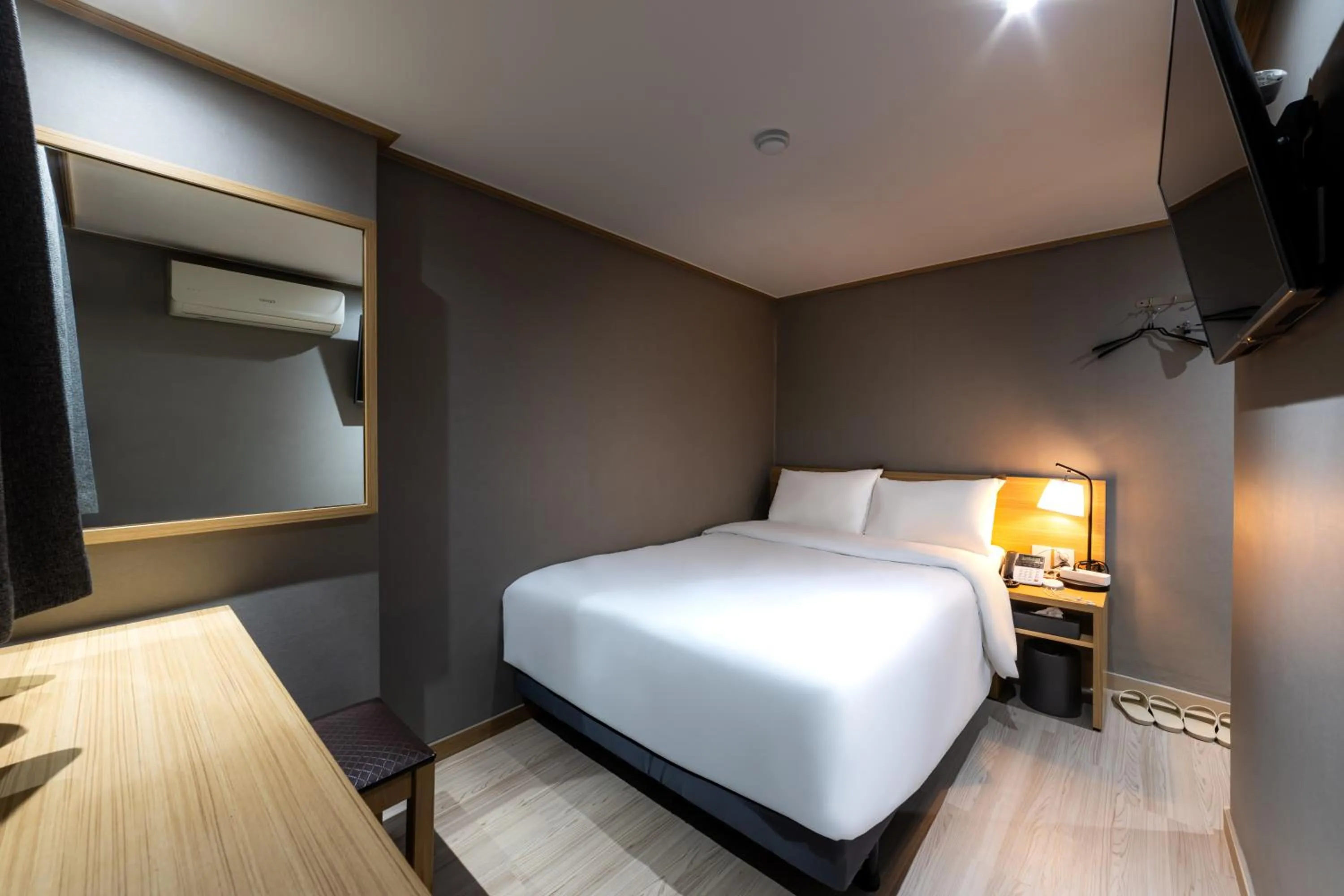 Bed in About Stay Seoul