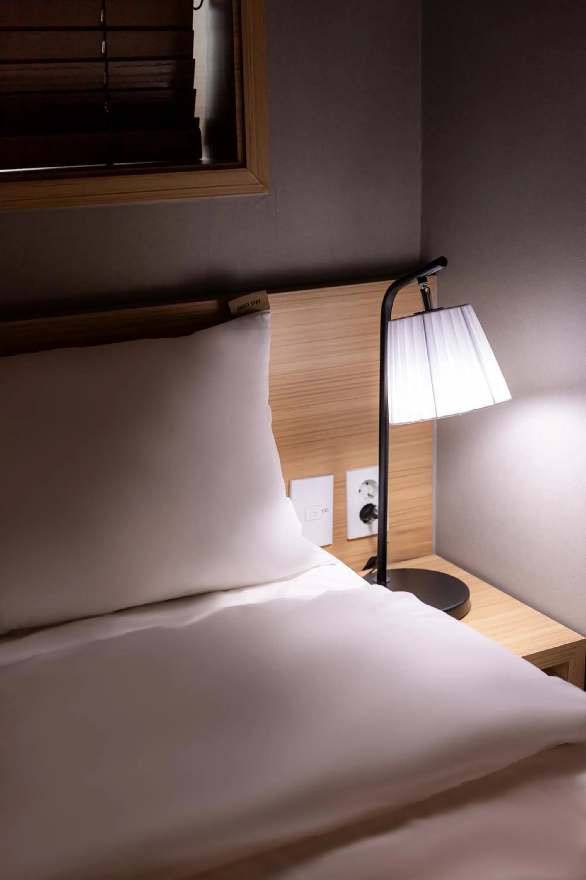 Bed in About Stay Seoul