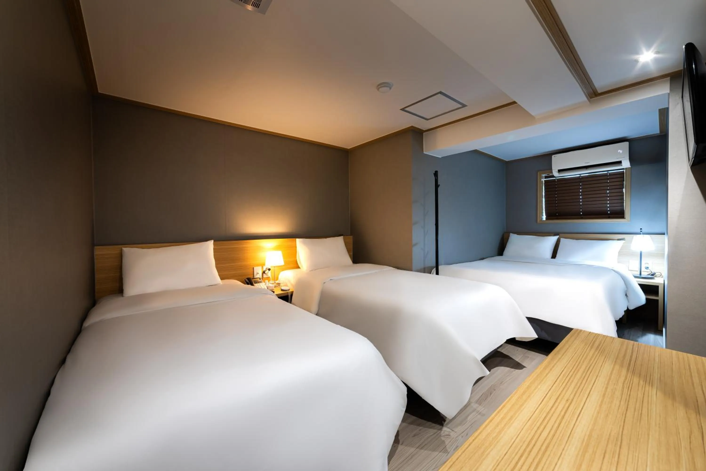 Bed in About Stay Seoul