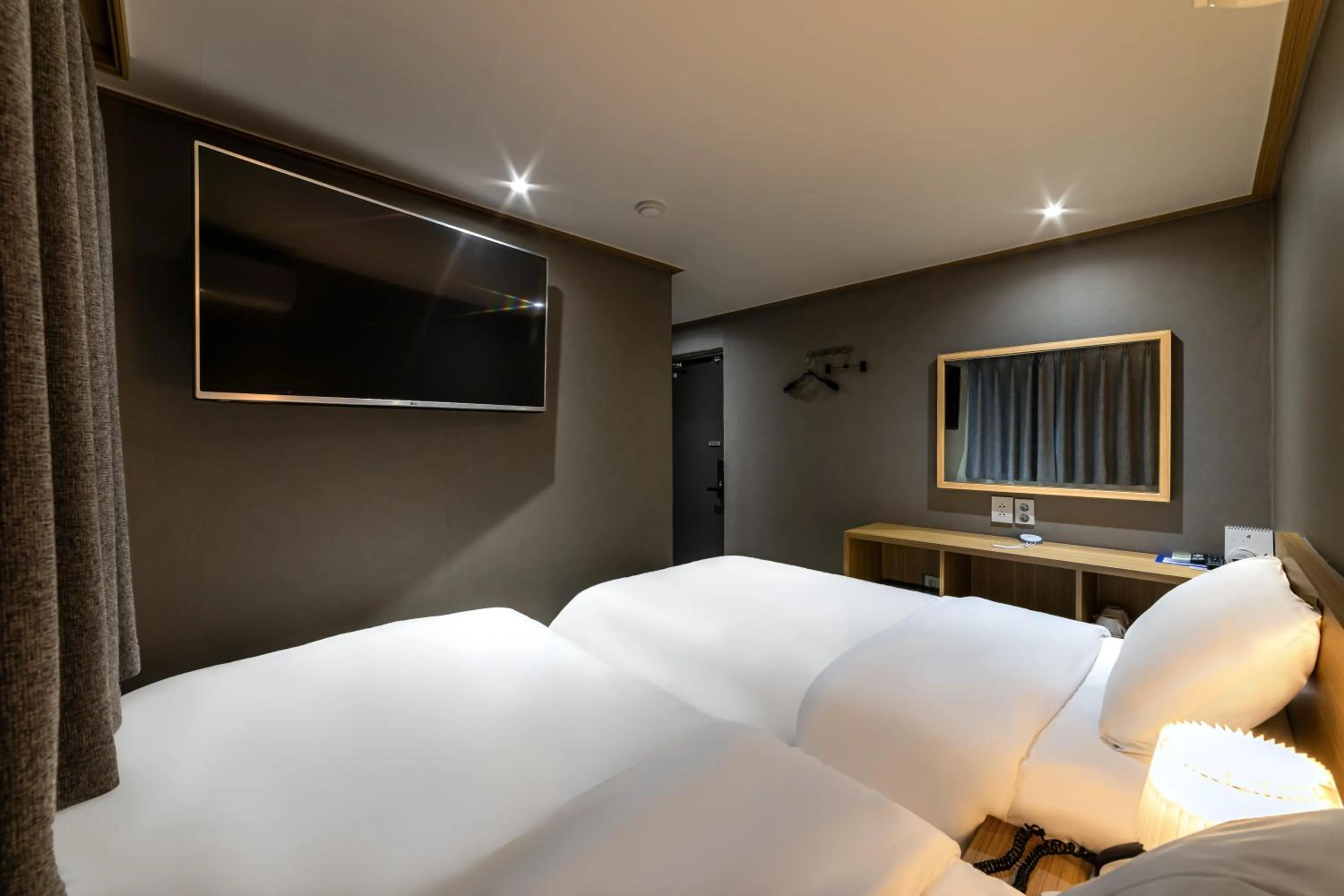 Bed in About Stay Seoul