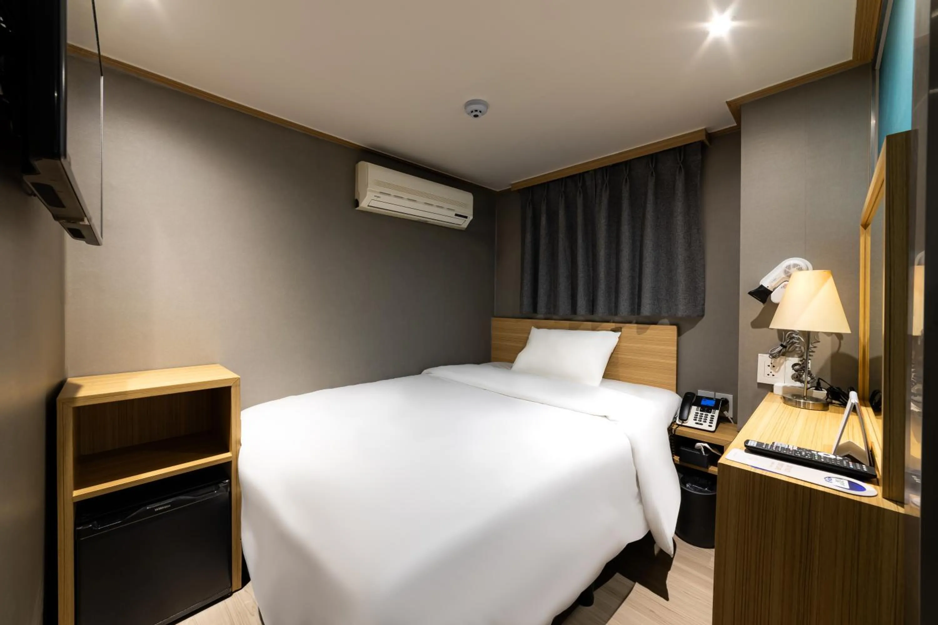 Bed in About Stay Seoul