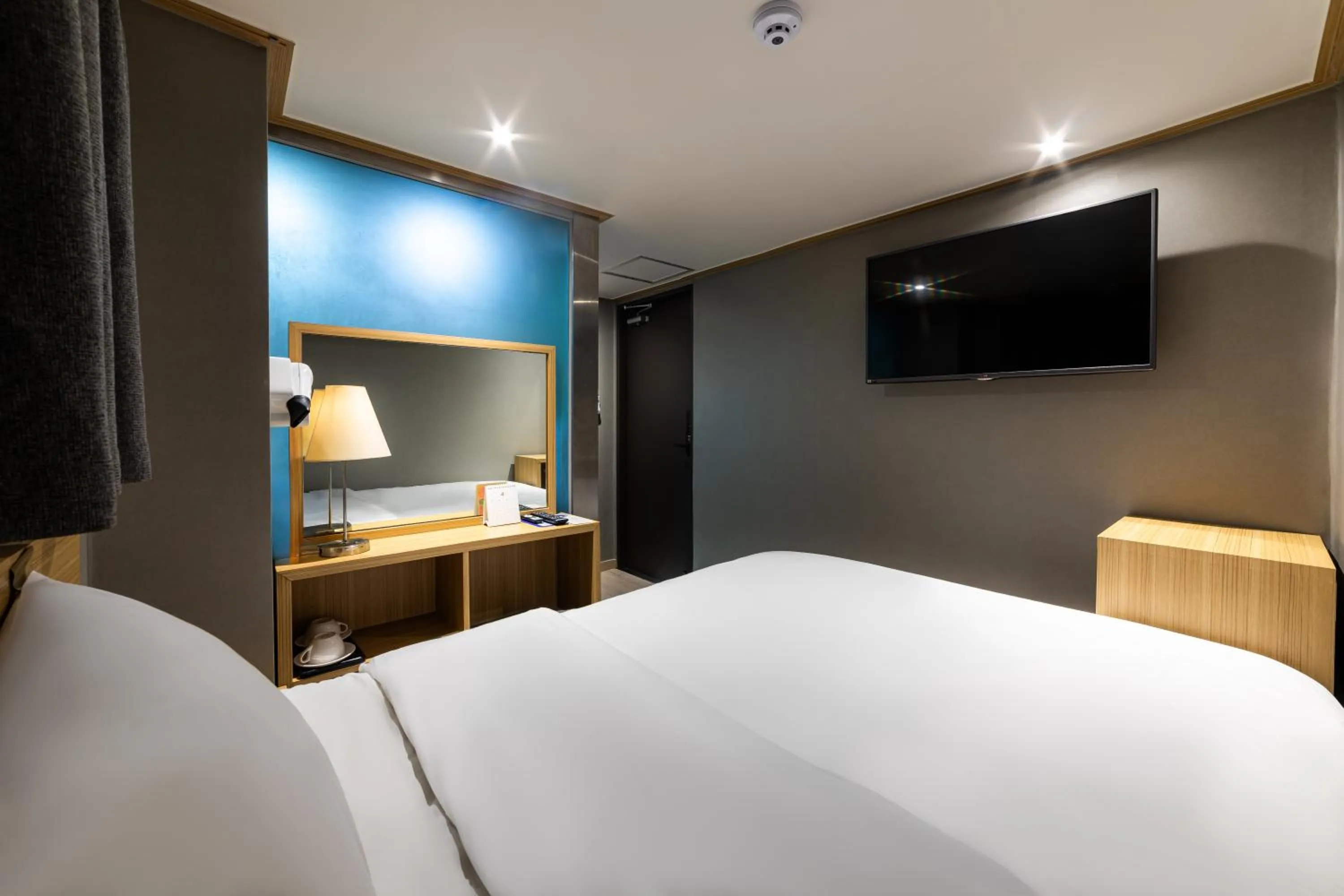 Bed in About Stay Seoul