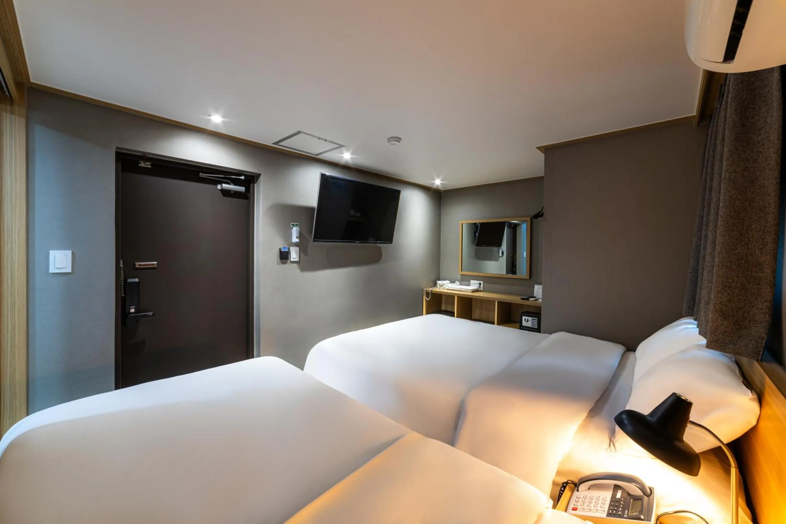 Bed in About Stay Seoul