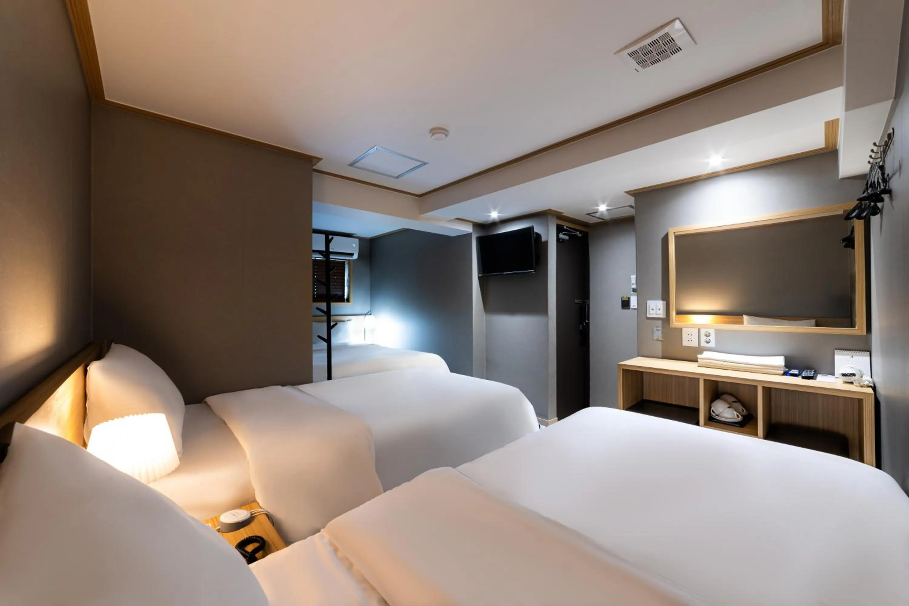 Bed in About Stay Seoul