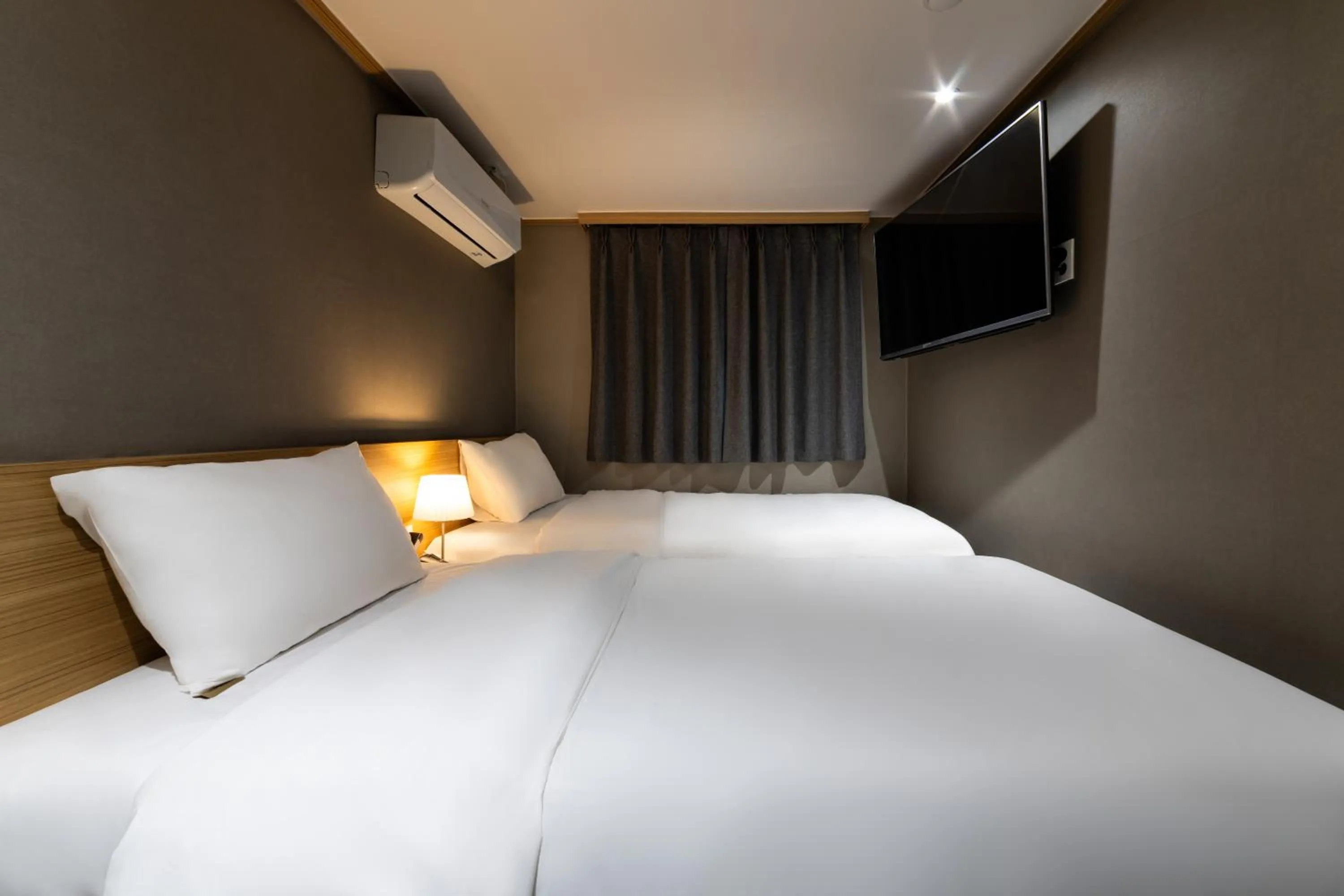 Bed in About Stay Seoul