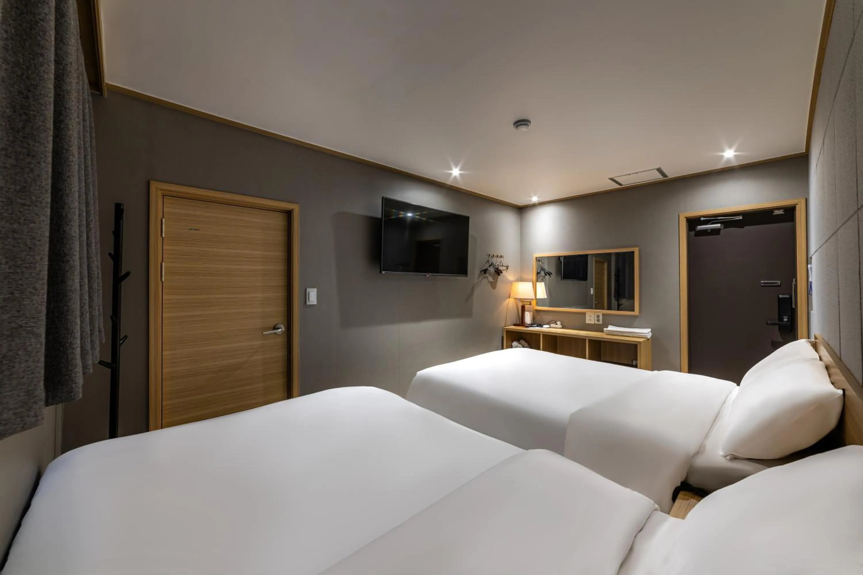 Bed in About Stay Seoul