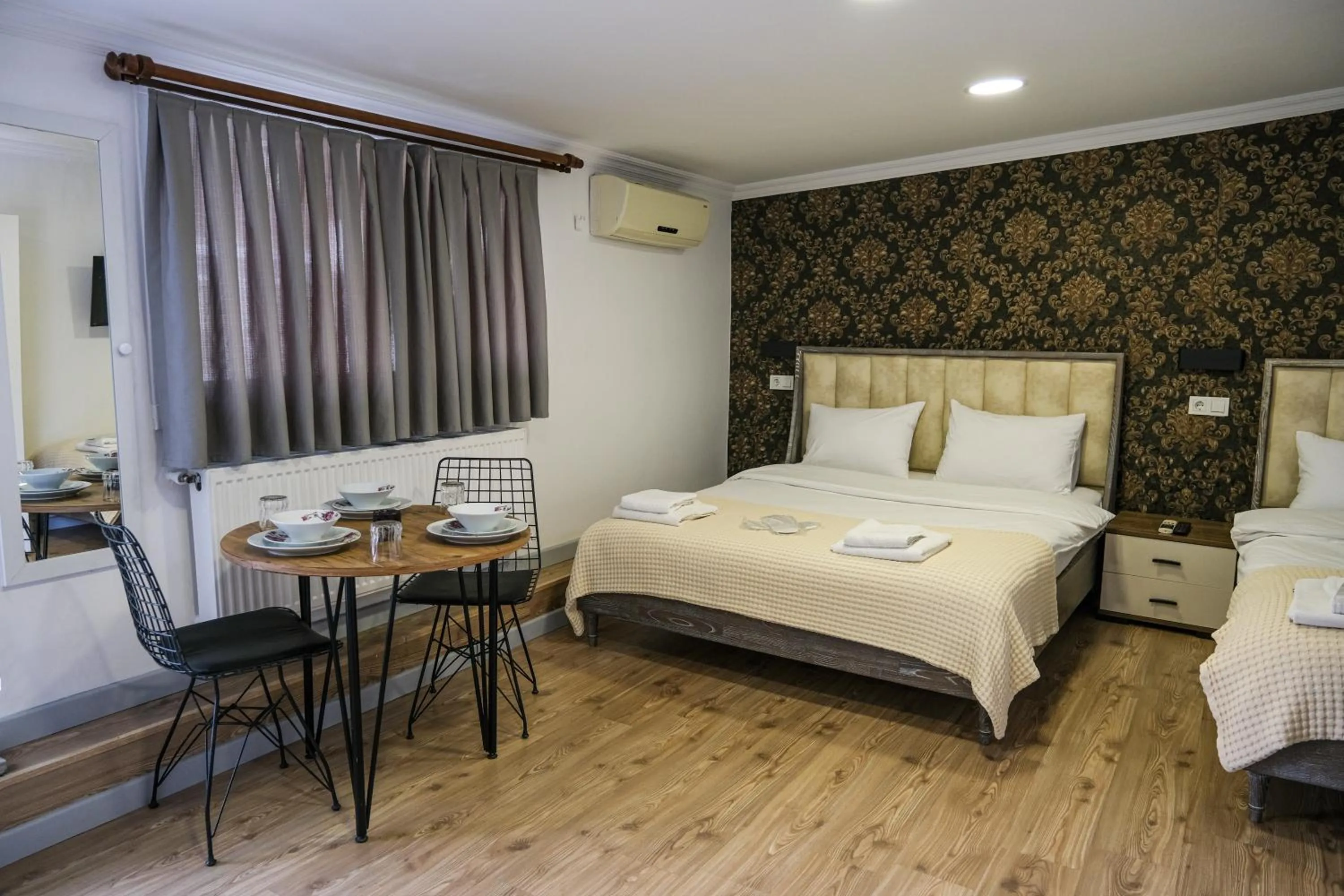 Seating area, Bed in Taksim Neo Pera Suites
