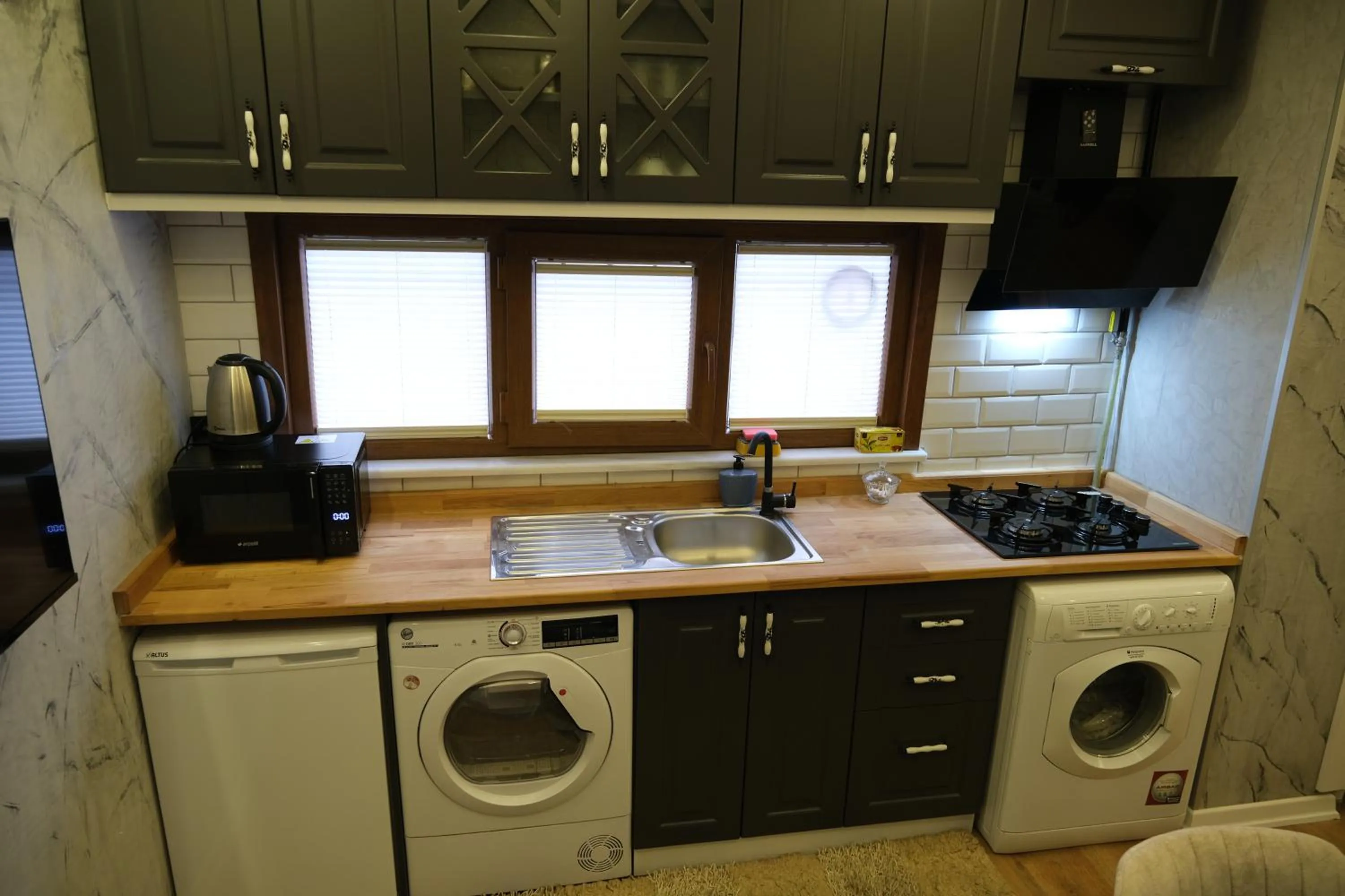 Kitchen or kitchenette in Taksim Neo Pera Suites