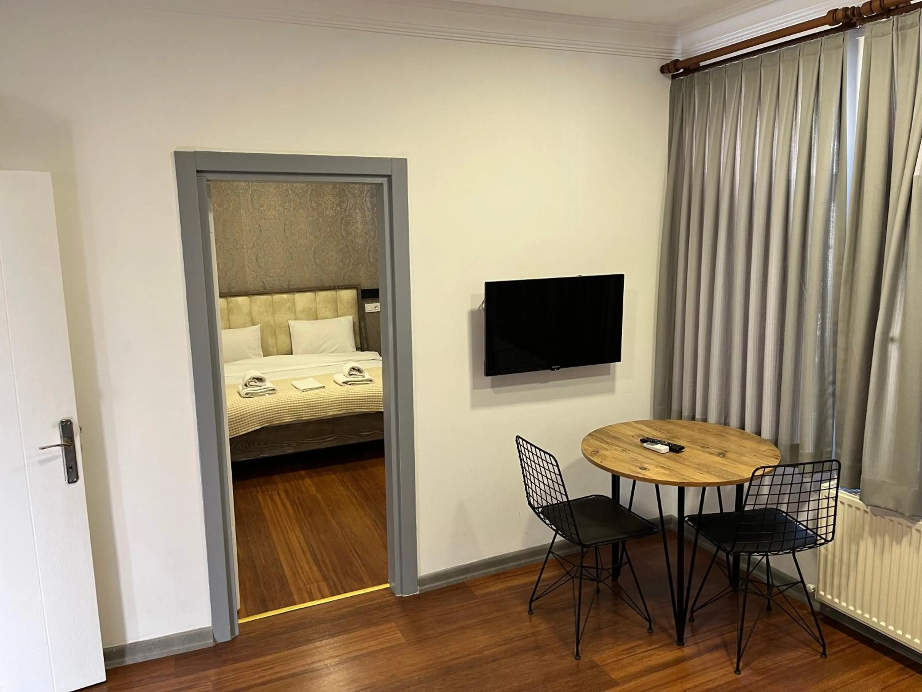 Communal lounge/ TV room, Bed in Taksim Neo Pera Suites