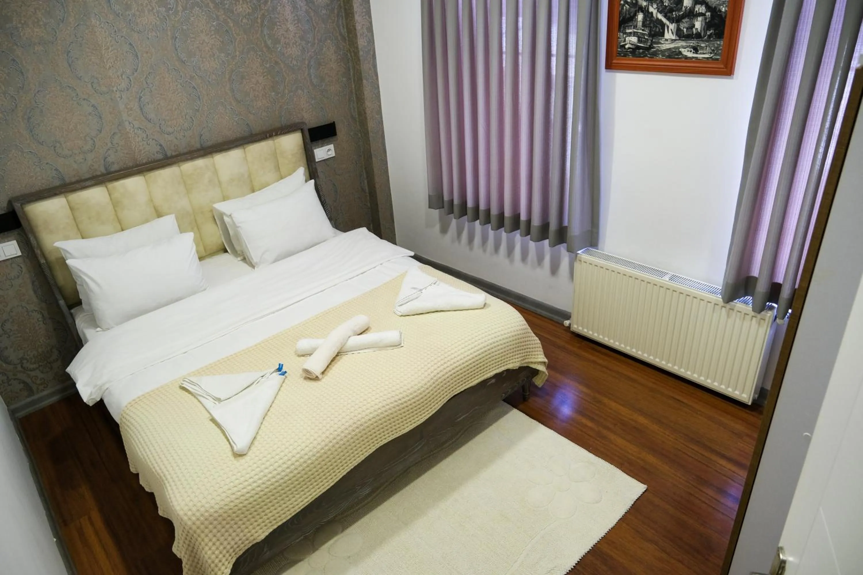 Bed in Taksim Neo Pera Suites