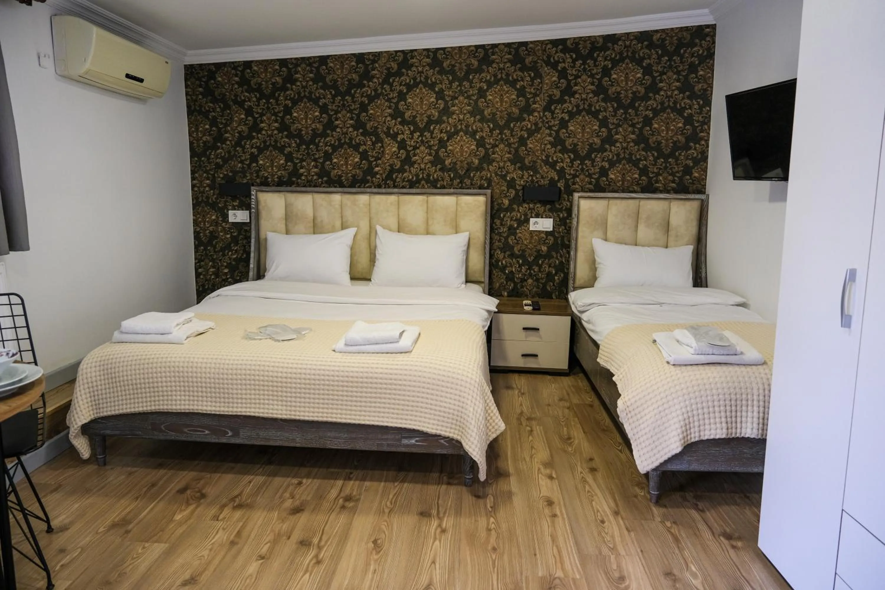Communal lounge/ TV room, Bed in Taksim Neo Pera Suites
