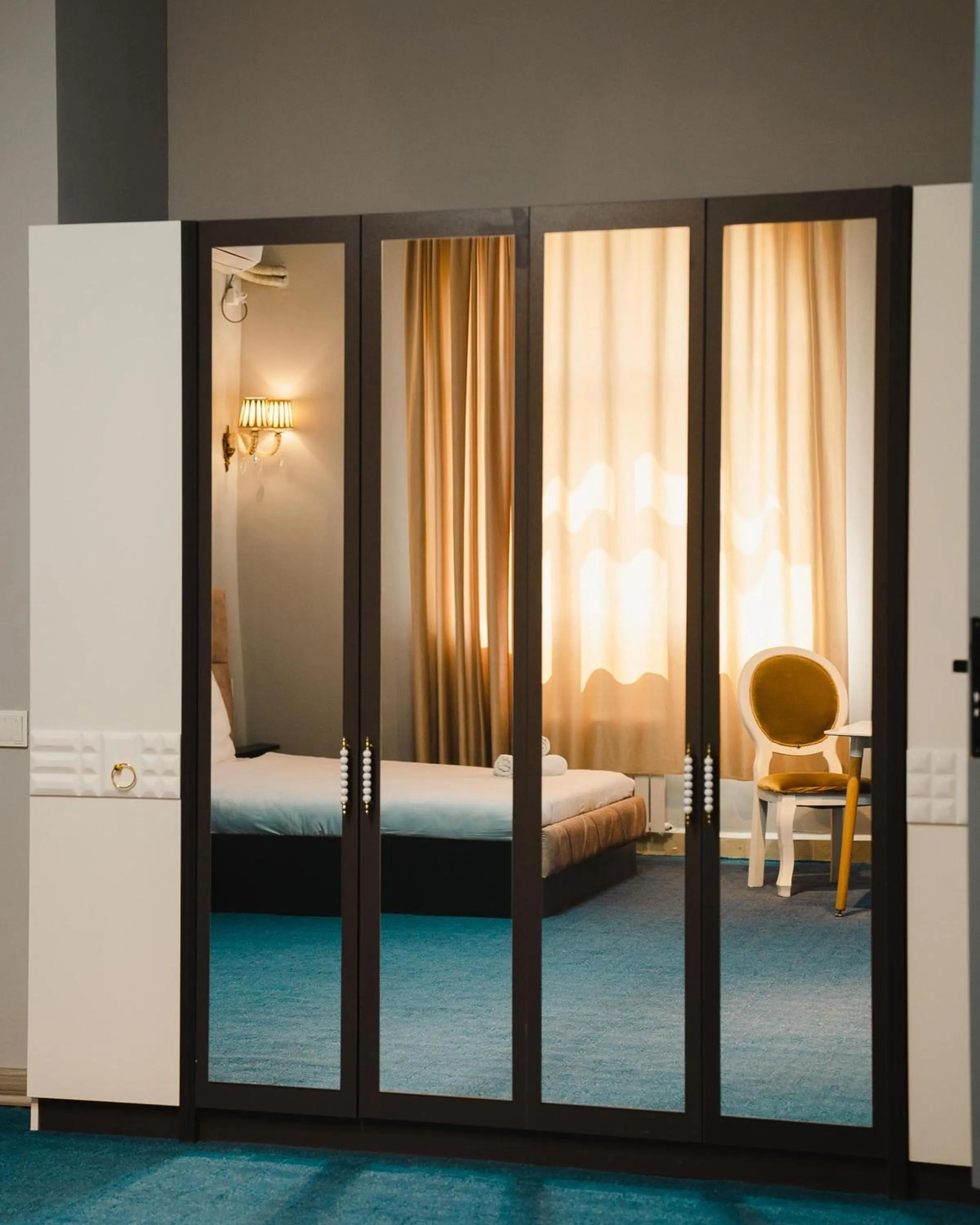 Bed in Olive Garden Baku Hotel