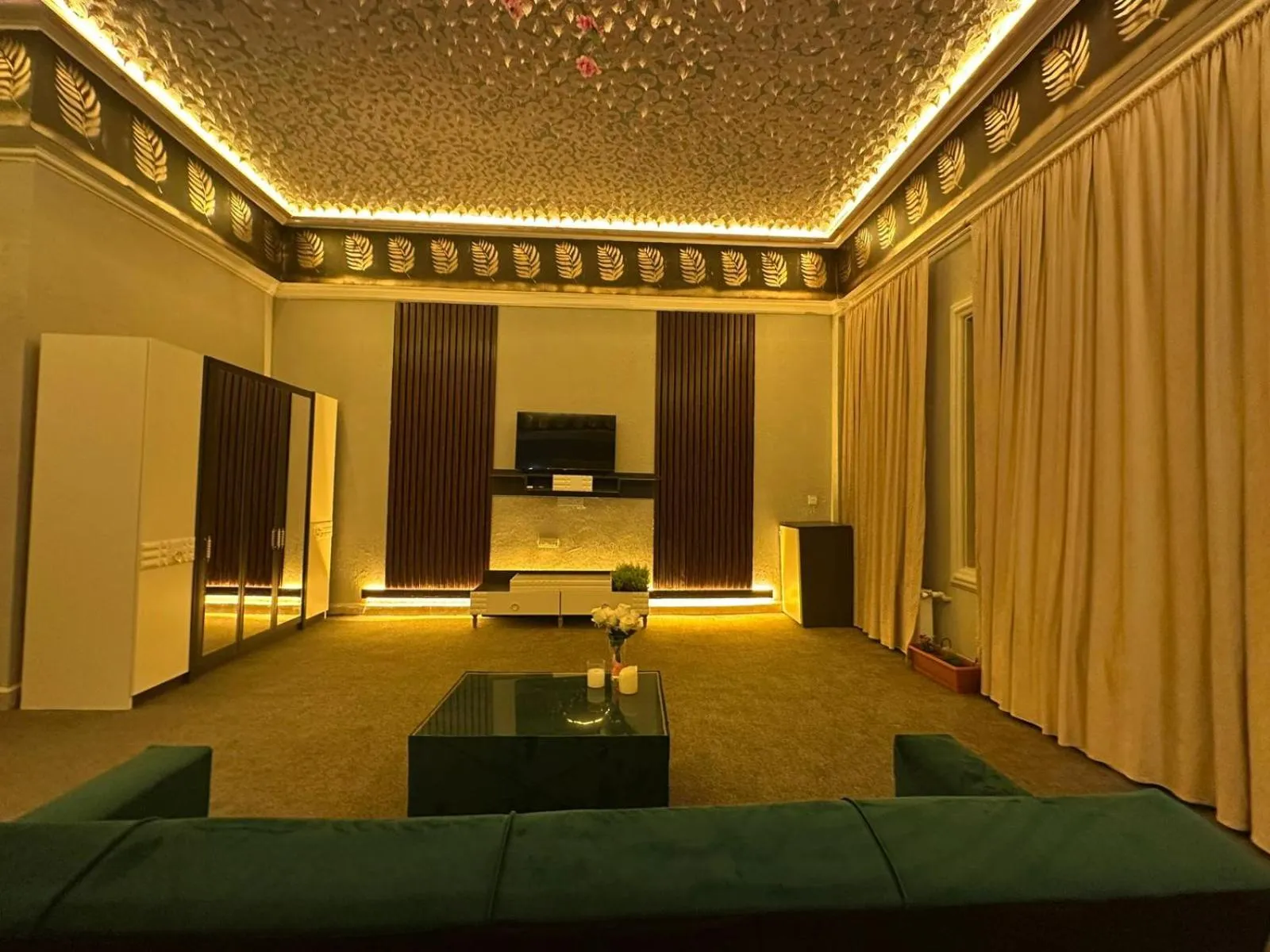 Communal lounge/ TV room in Olive Garden Baku Hotel