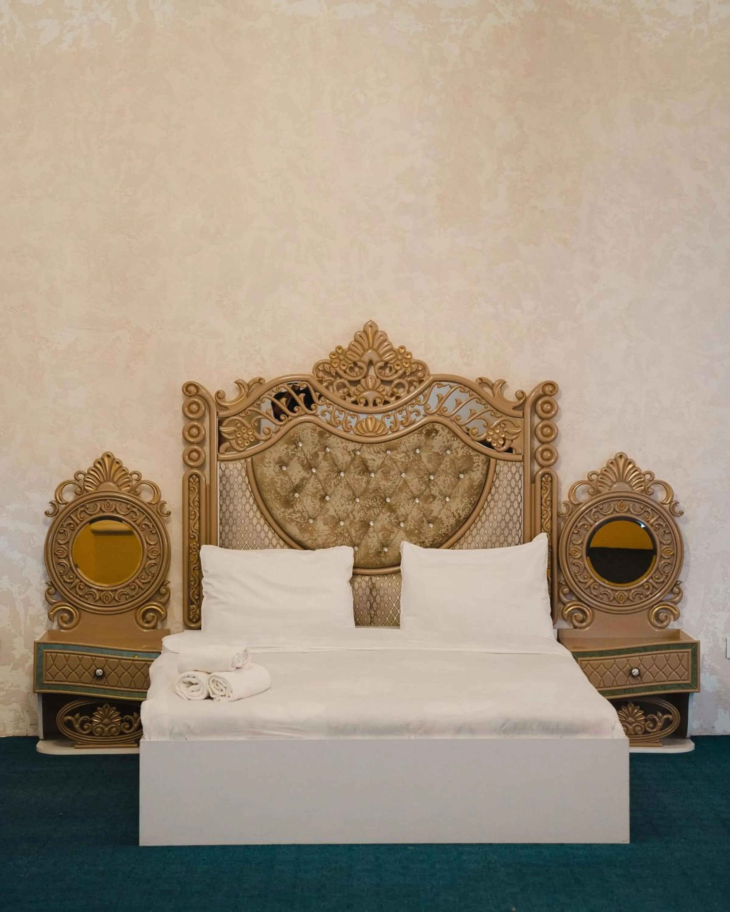 Bed in Olive Garden Baku Hotel