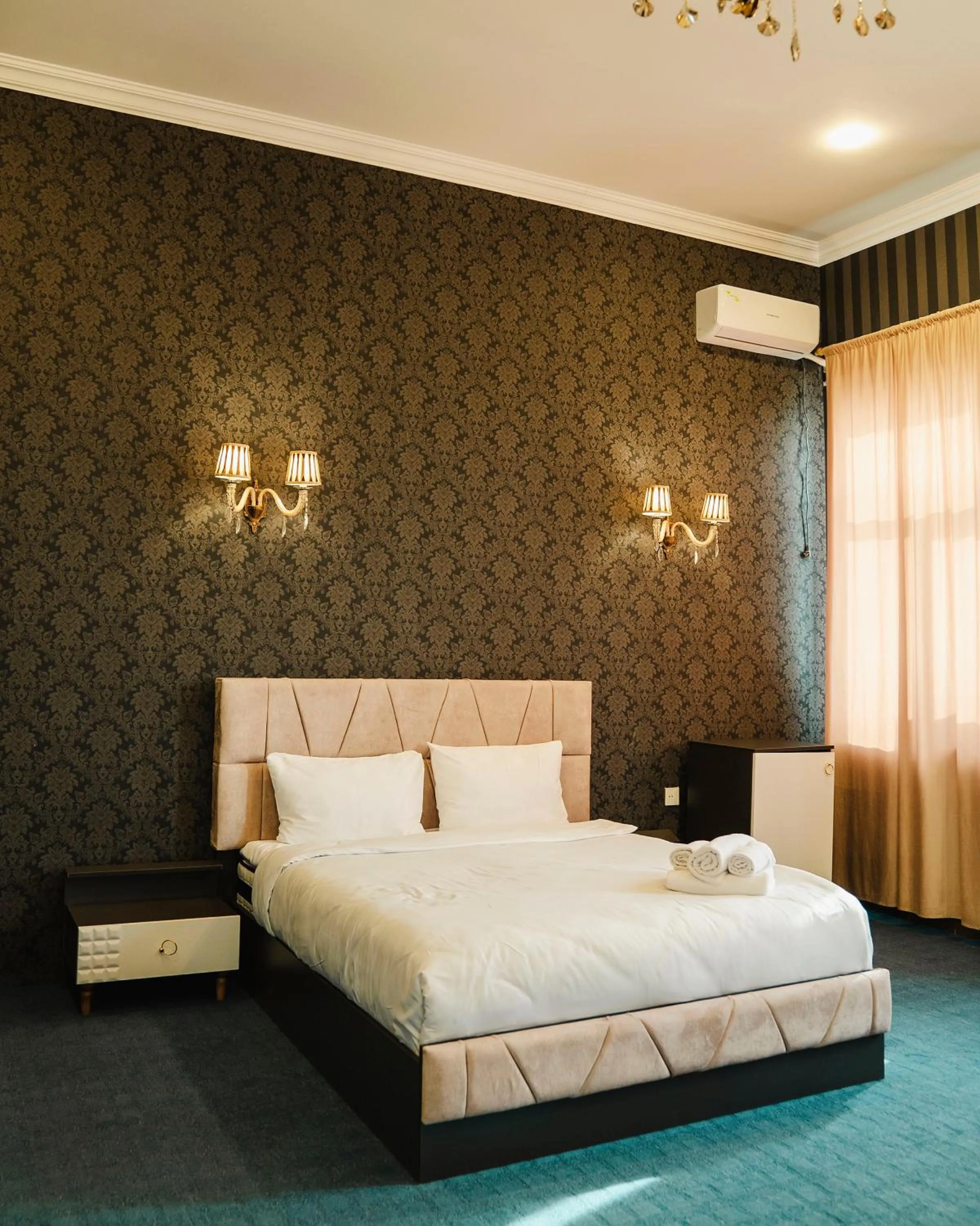 Bed in Olive Garden Baku Hotel