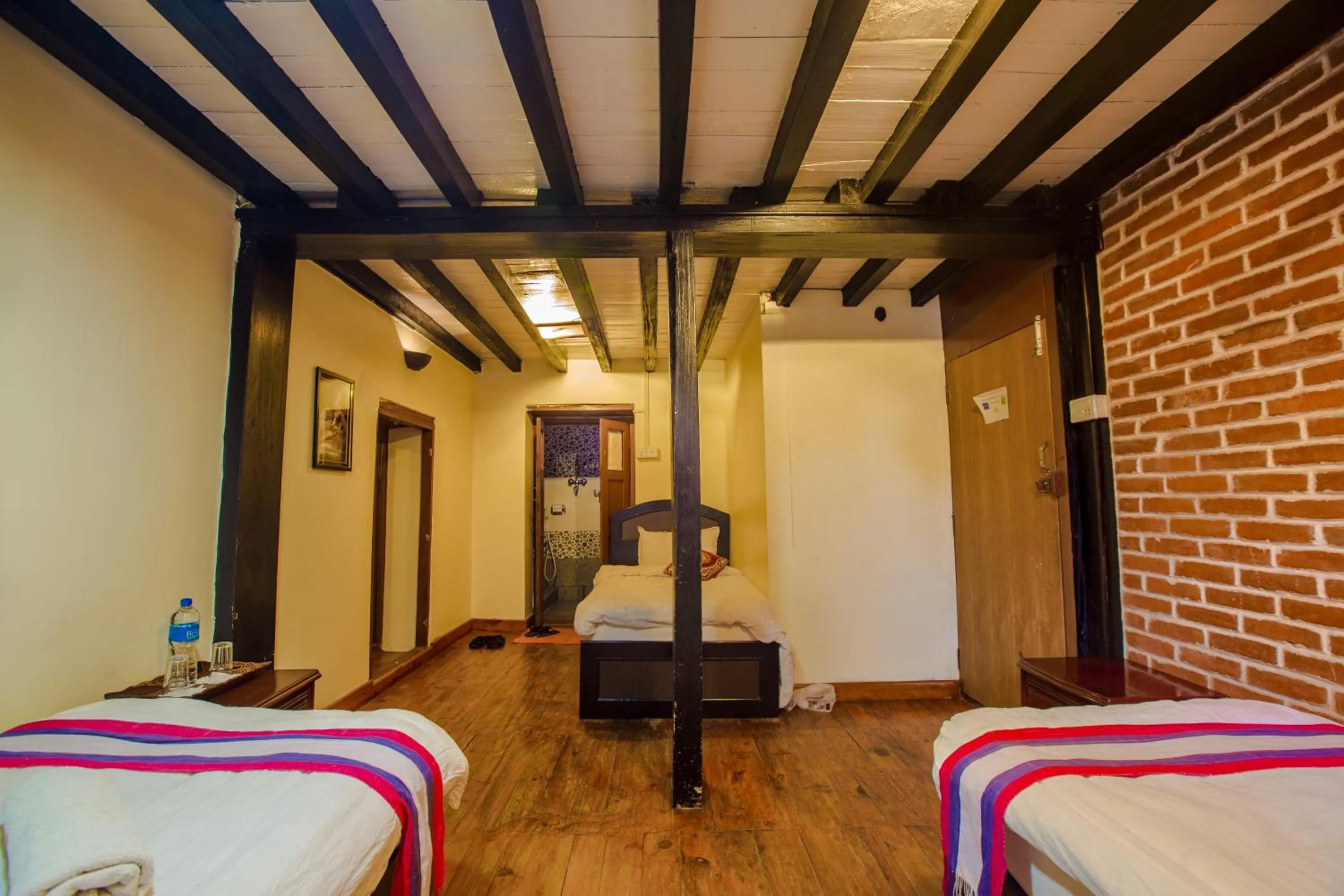 Bed in Tulaja Boutique Hotel