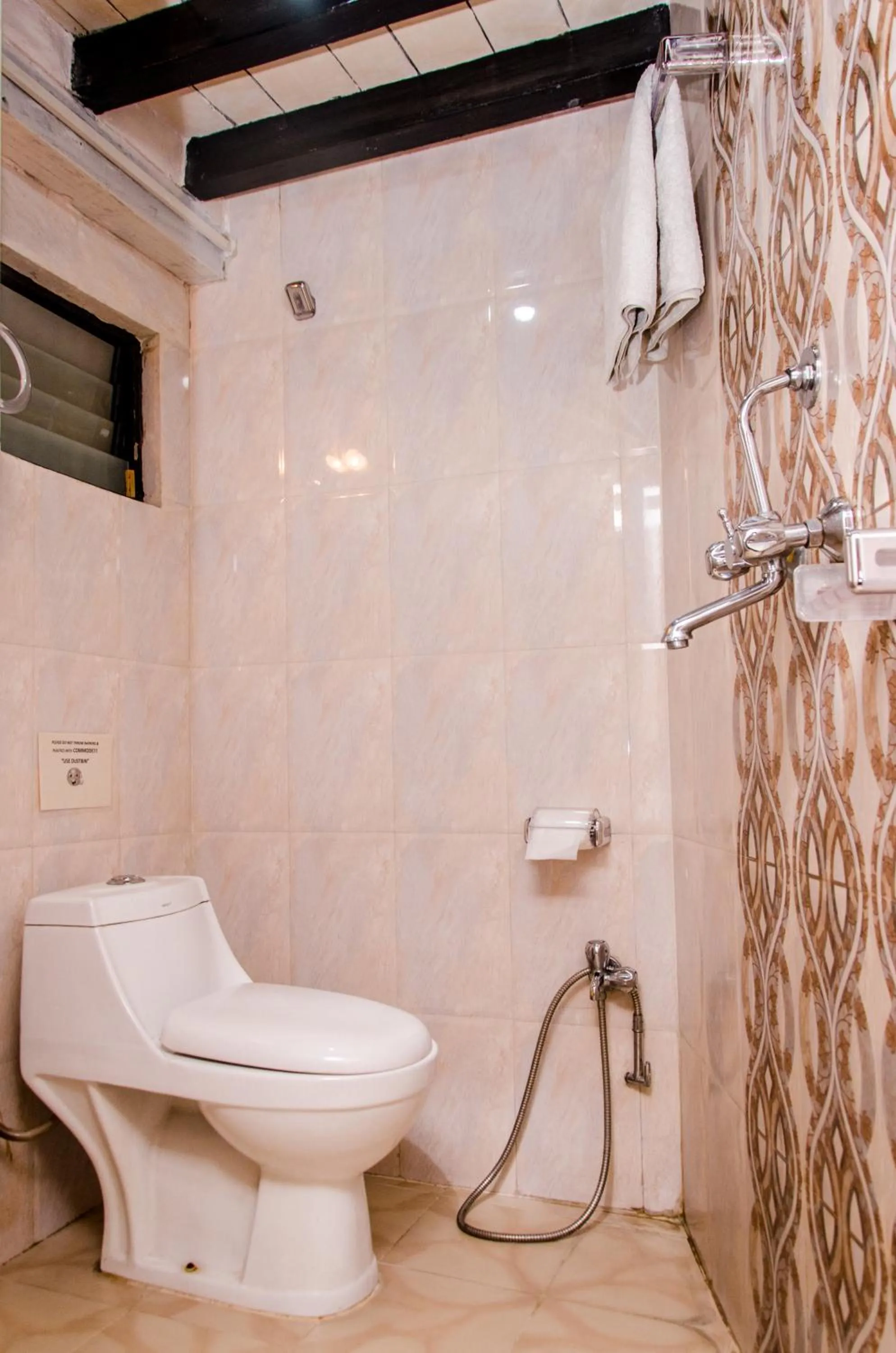 Toilet in Tulaja Boutique Hotel