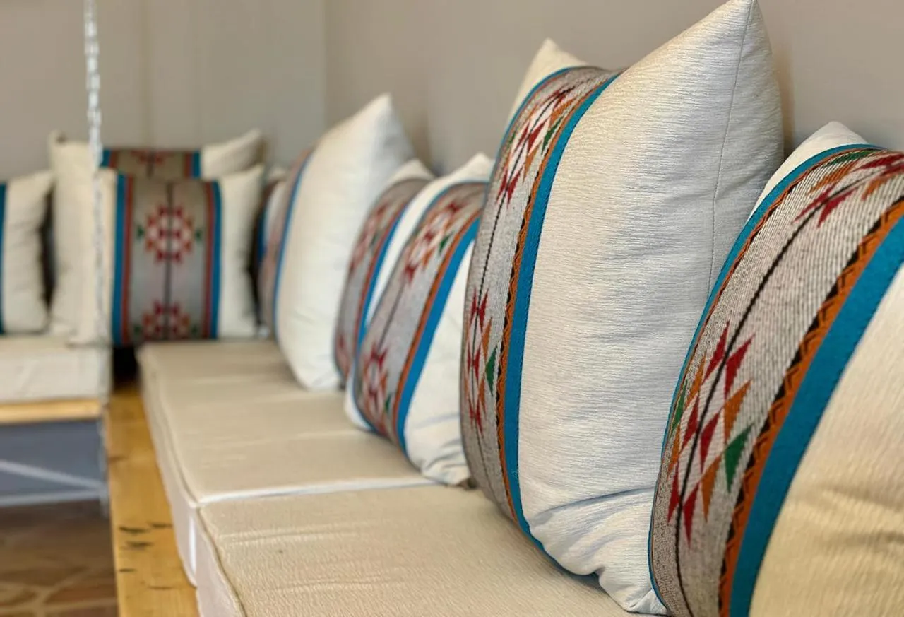 Seating area, Bed in Beit Ahlan