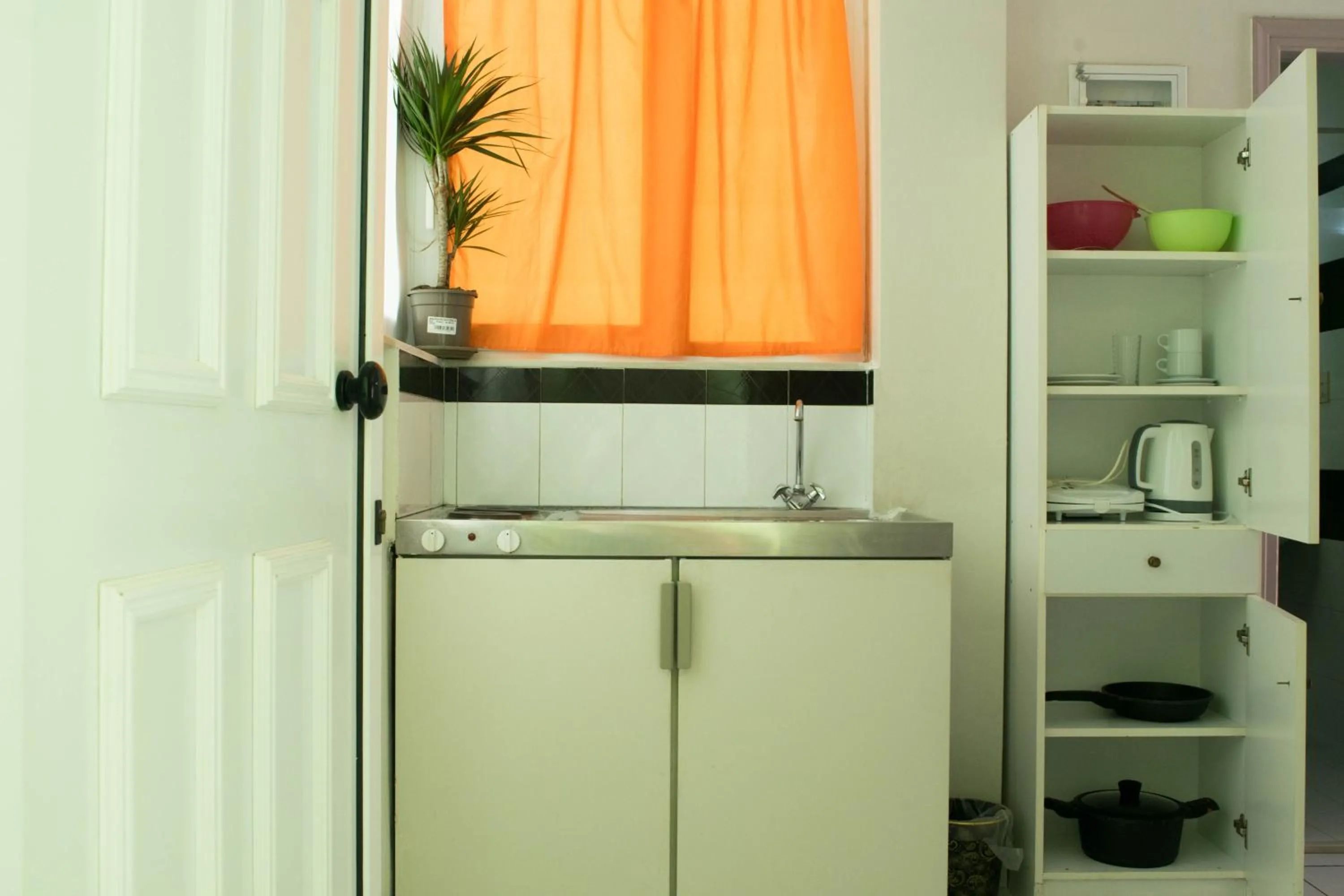 Kitchen or kitchenette in Greta Apartments