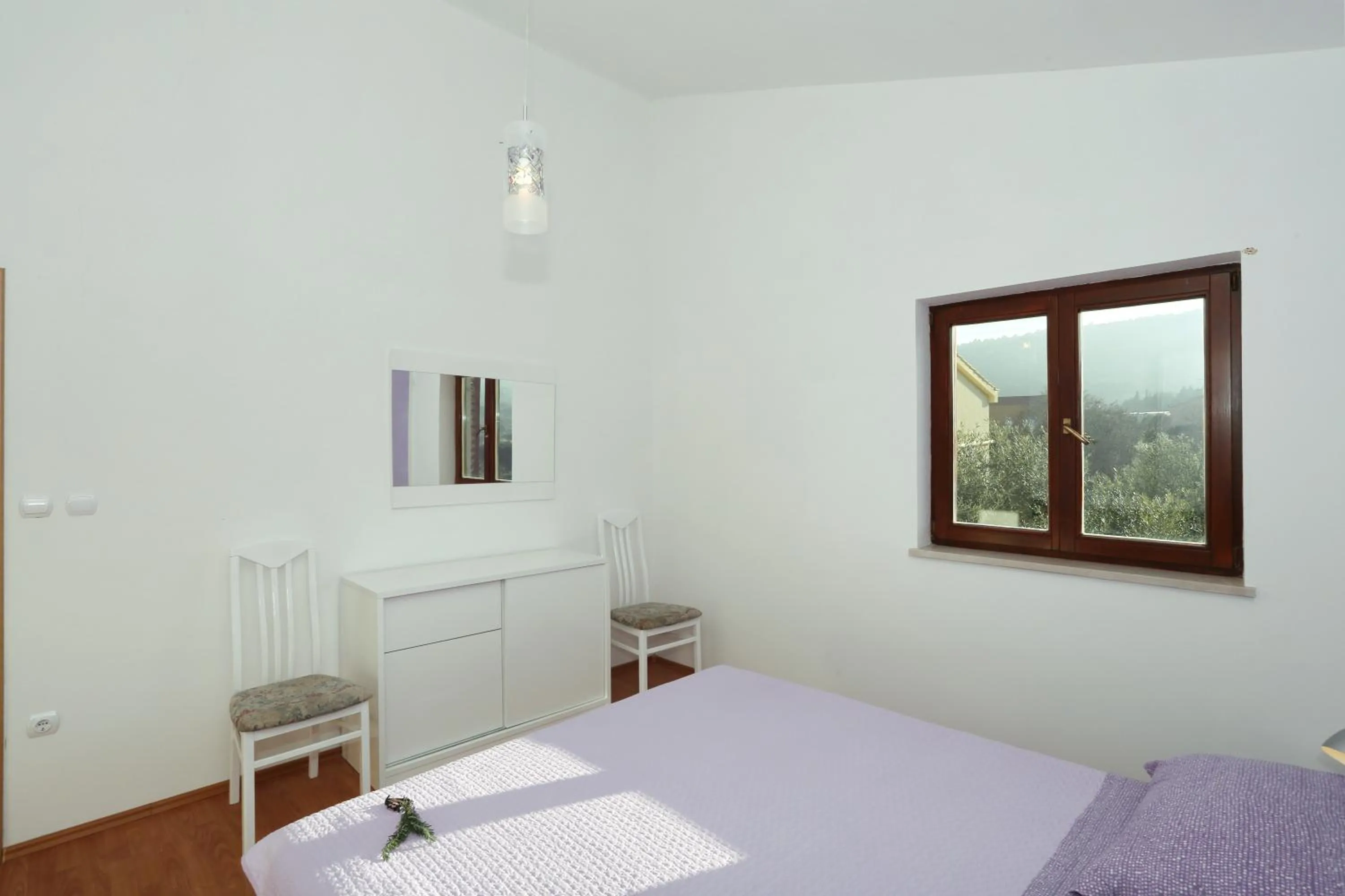 Bedroom in Apartments Maslina Božava
