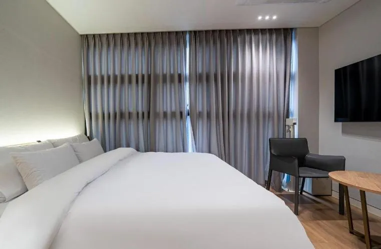 Bed in Lagobaum Hotel