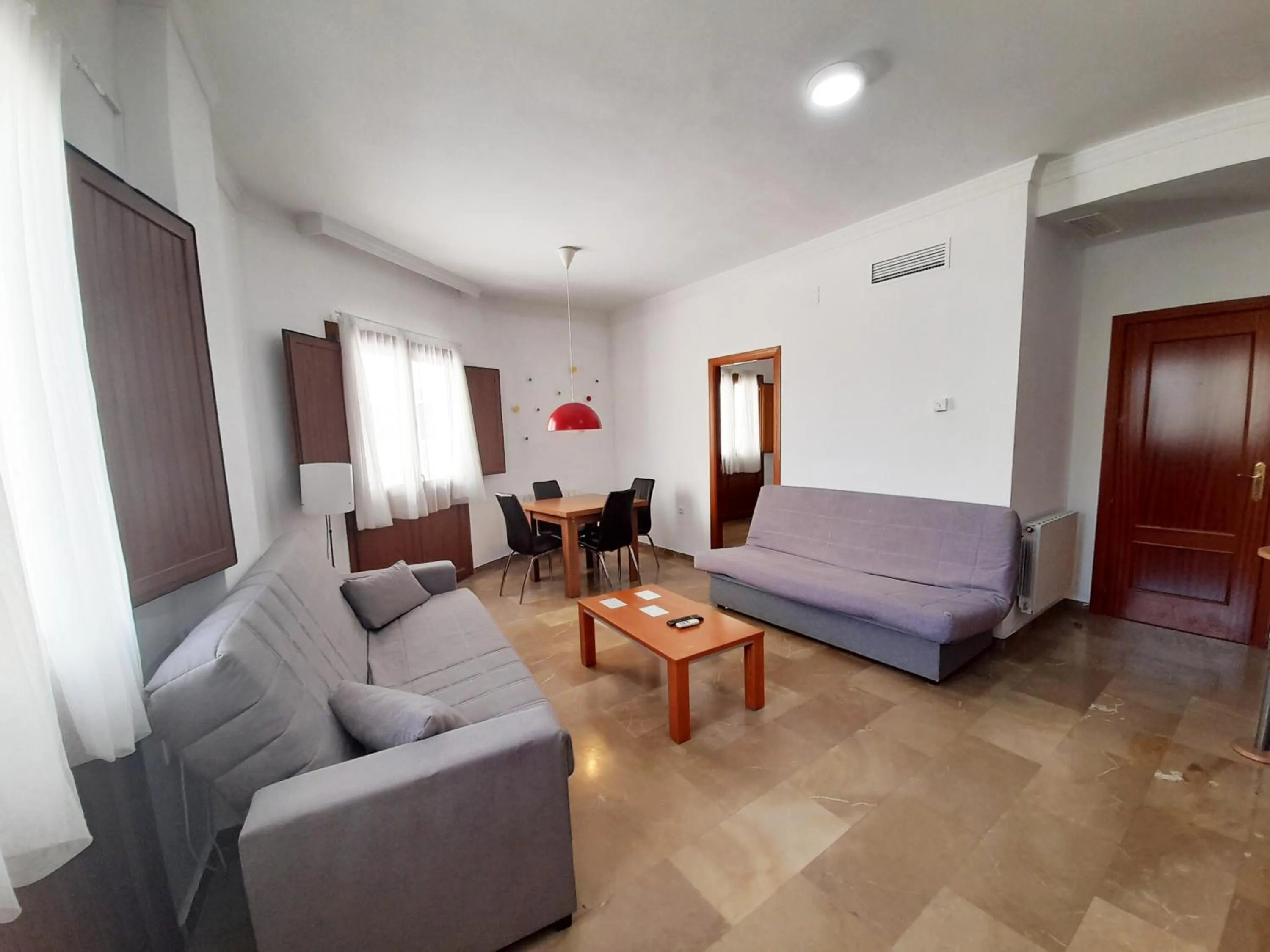 Living room, Bed in Apartamentos Catedral Plaza 3000