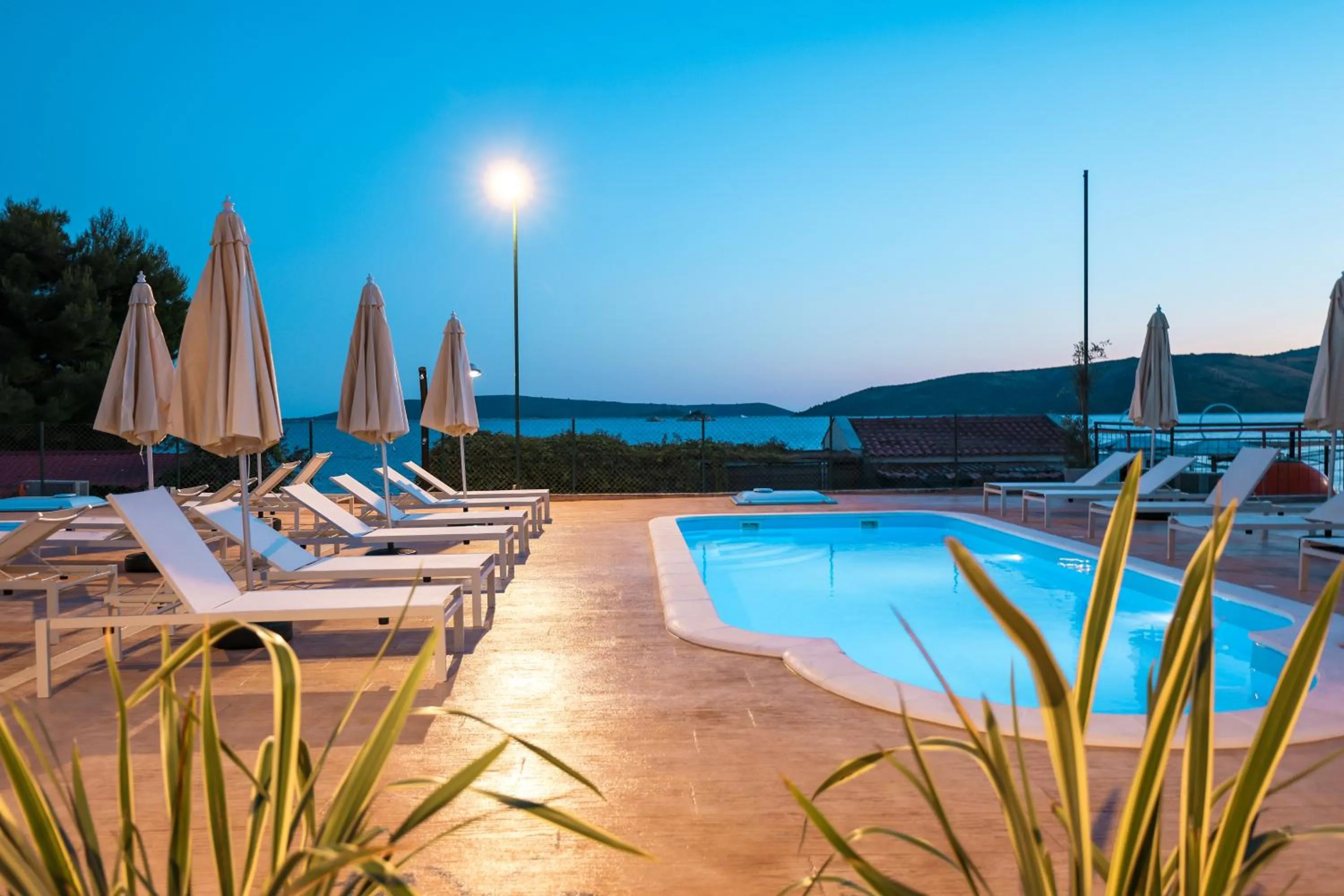 Pool view in Apartments Medena