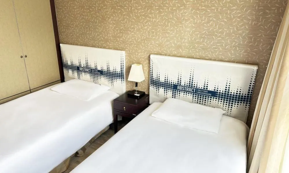 Bed in Centum City Hotel