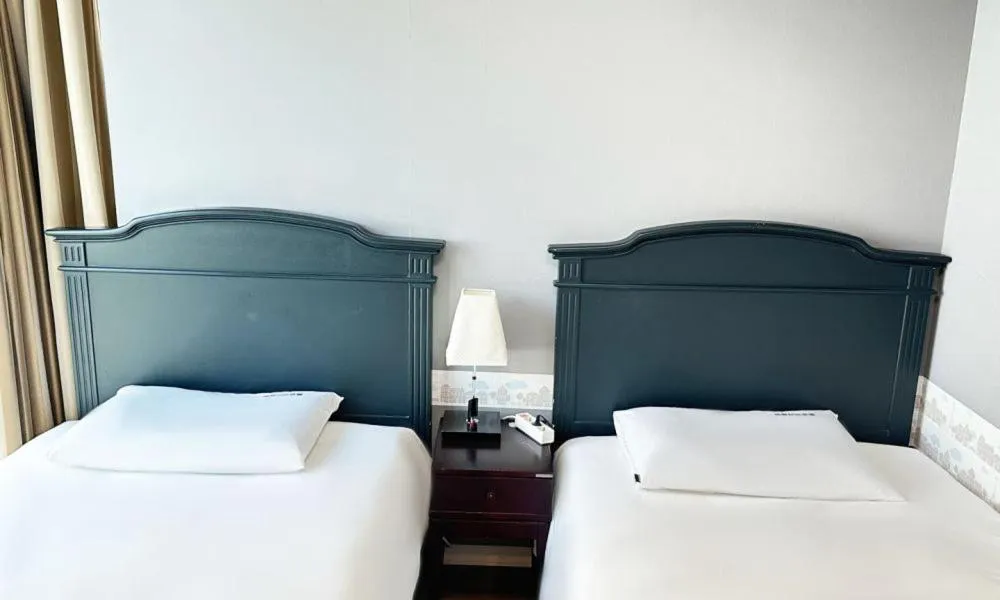 Bed in Centum City Hotel