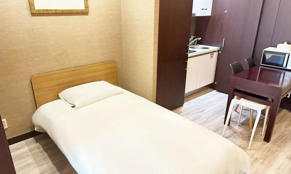 Bed in Centum City Hotel