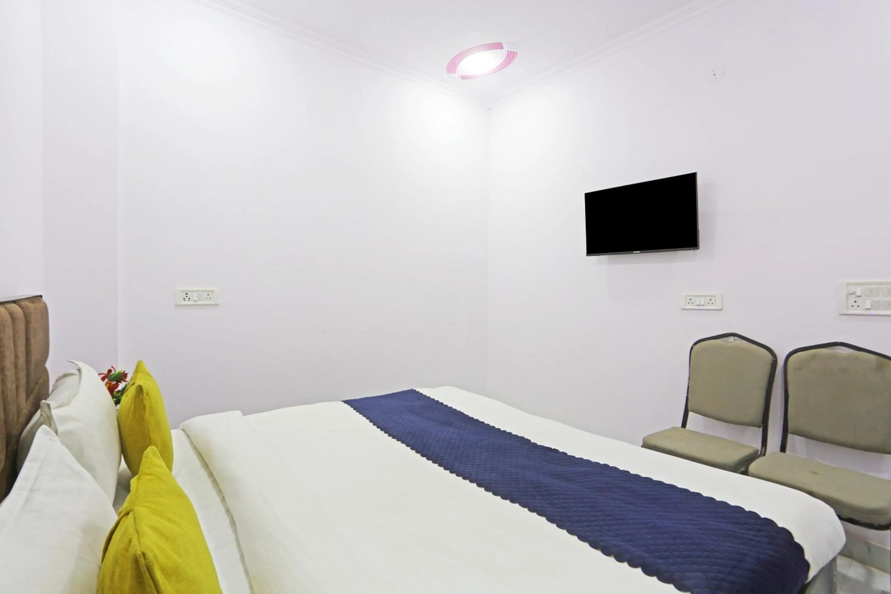 Bed in Twamev Residency