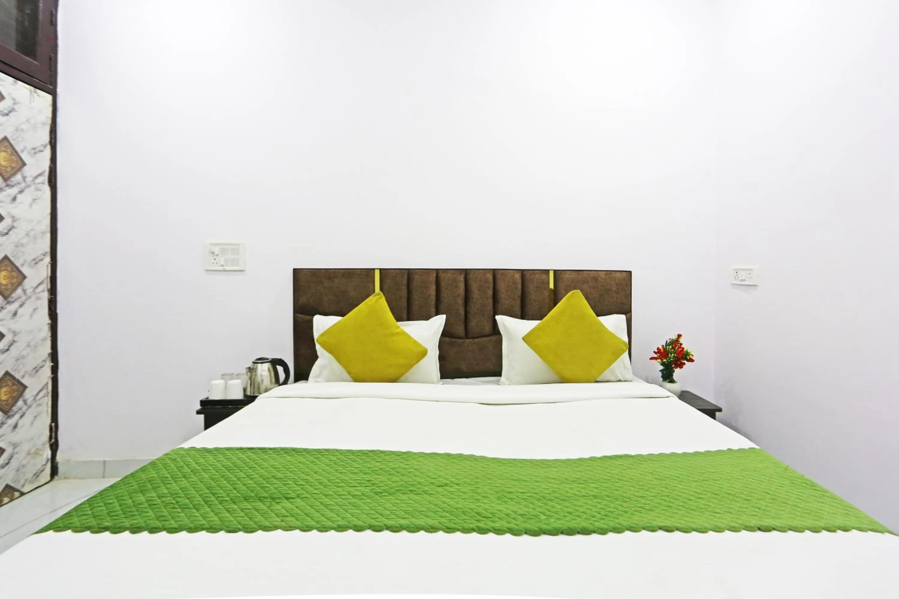 Bed in Twamev Residency