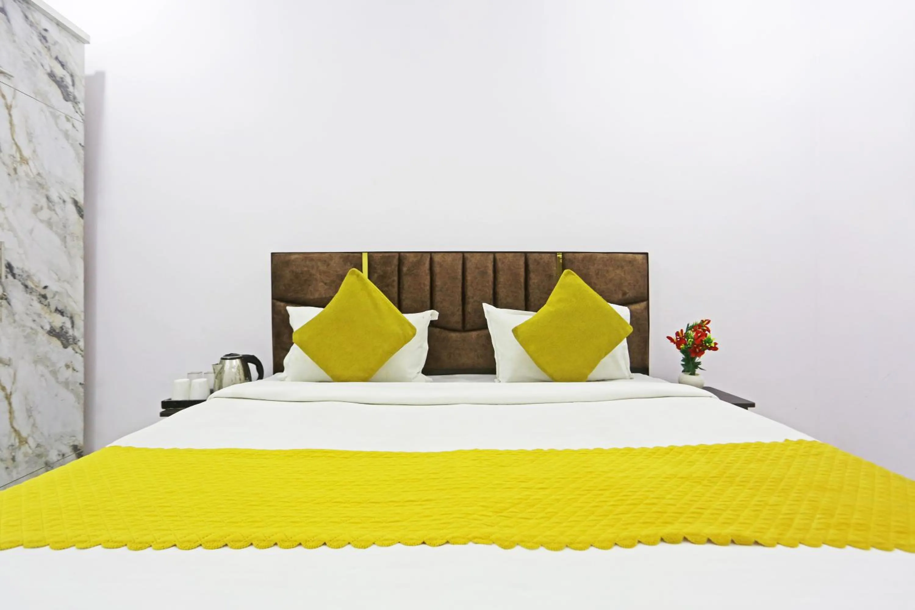 Bed in Twamev Residency