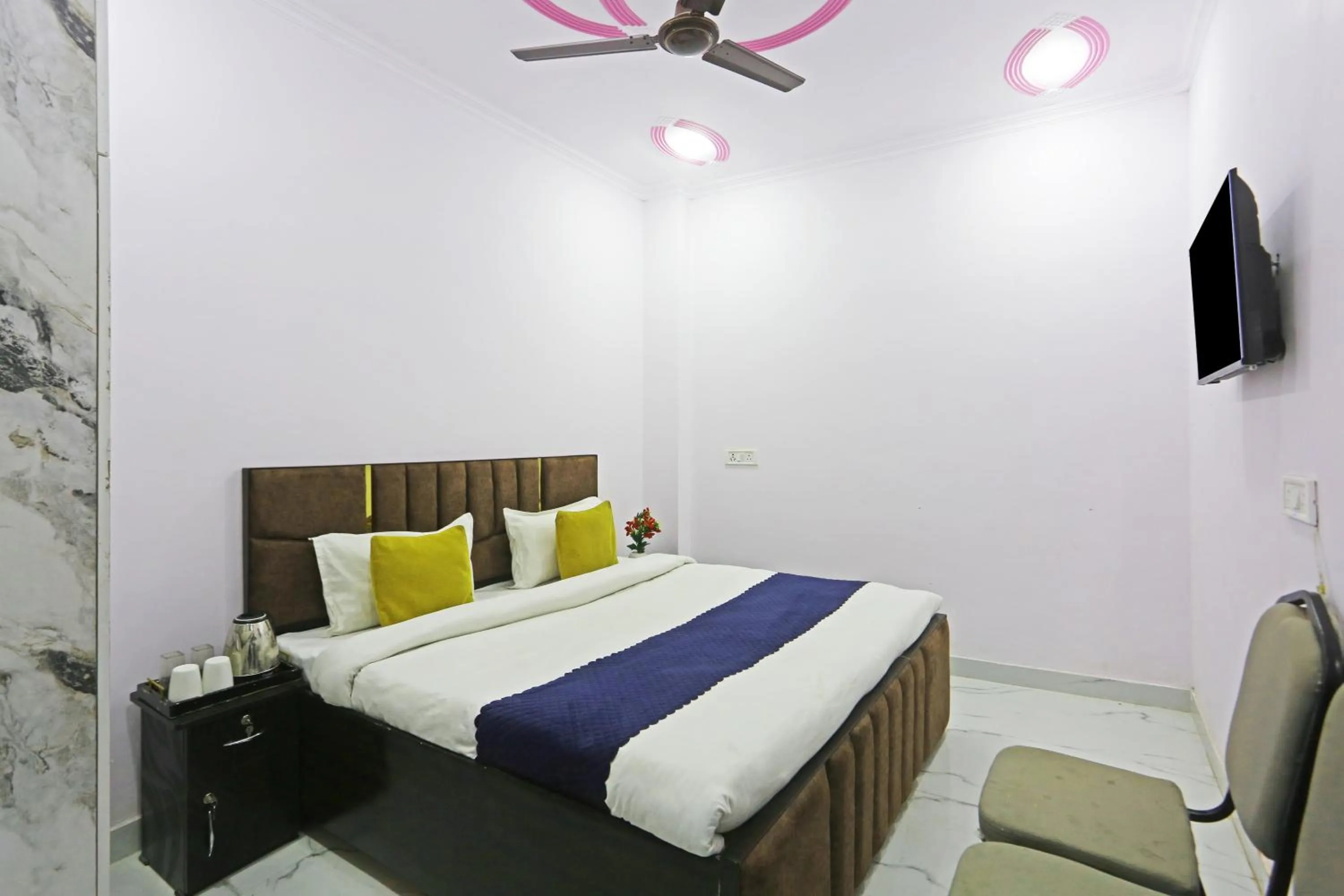 Bed in Twamev Residency