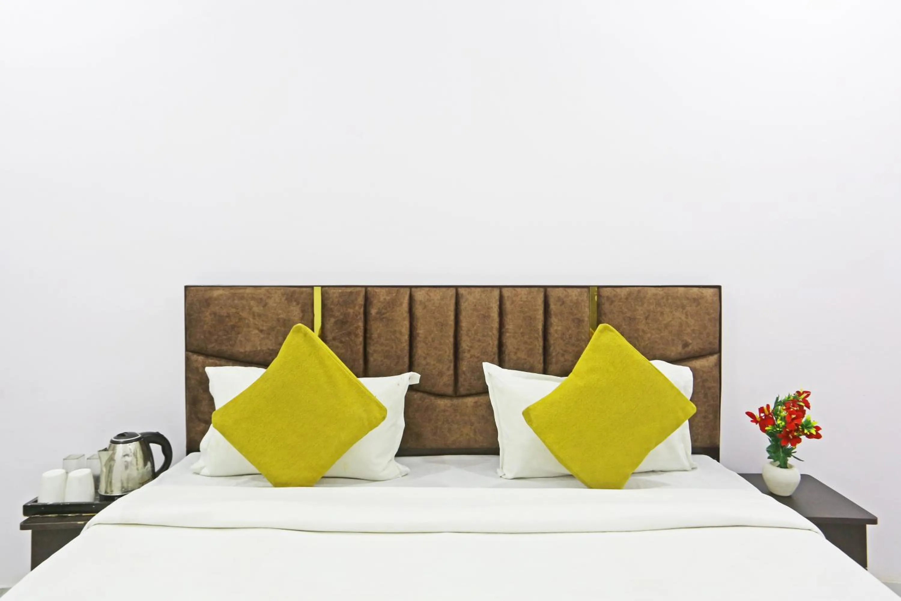 Bed in Twamev Residency