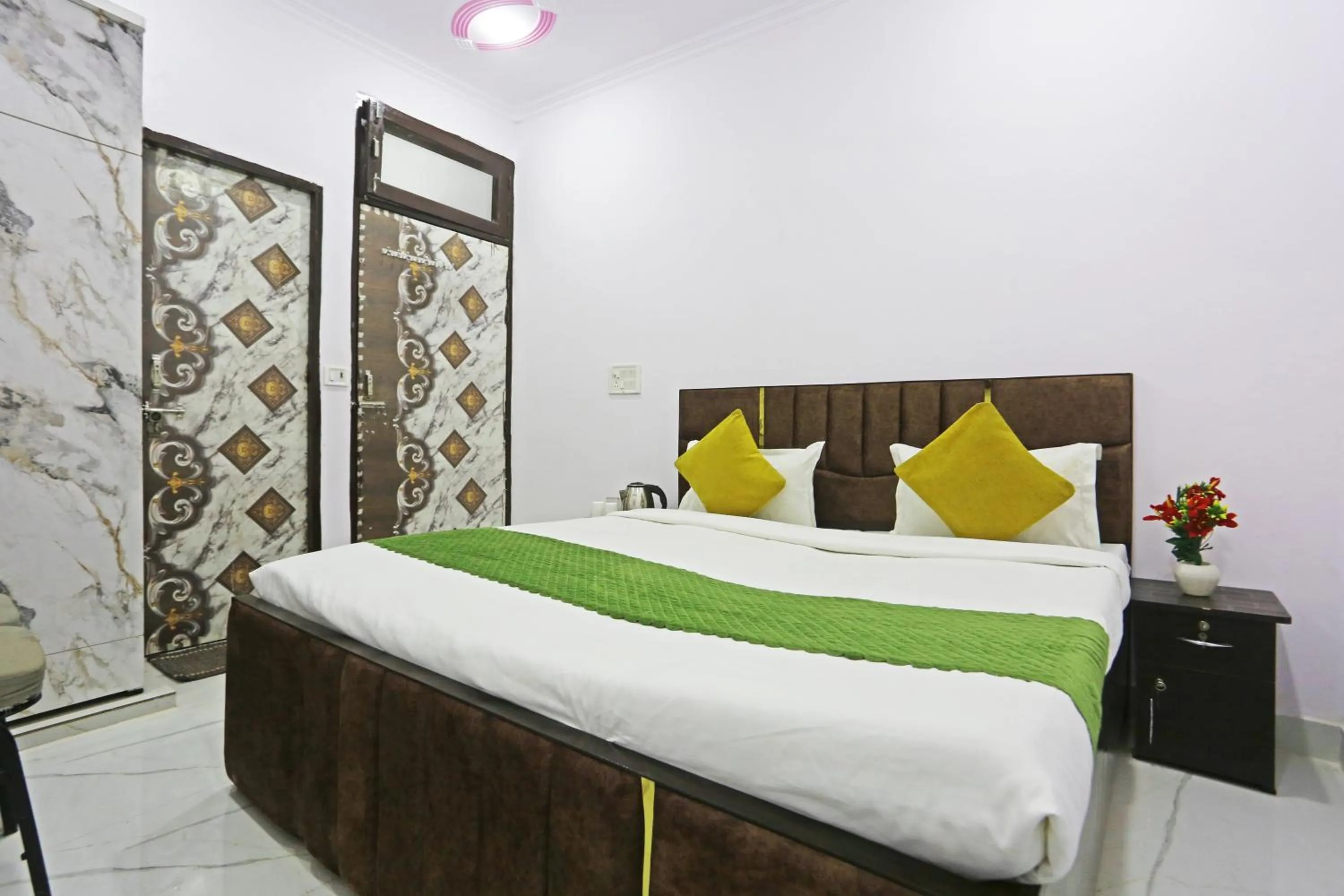 Bed in Twamev Residency