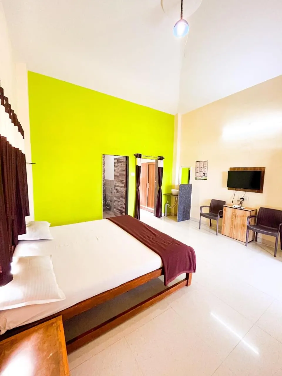 Photo of the whole room, Bed in Madhura Agro Tourism