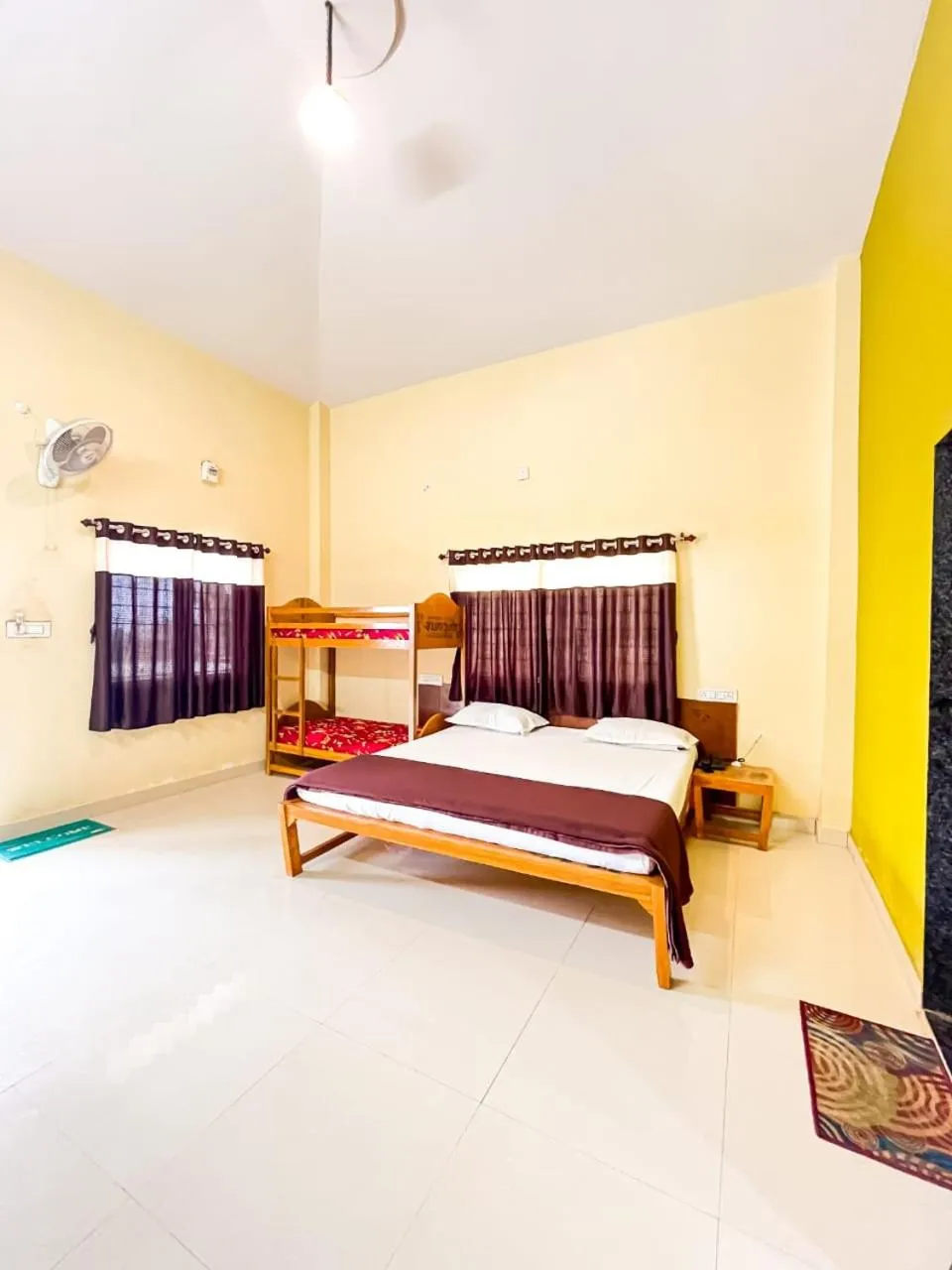 Photo of the whole room, Bed in Madhura Agro Tourism