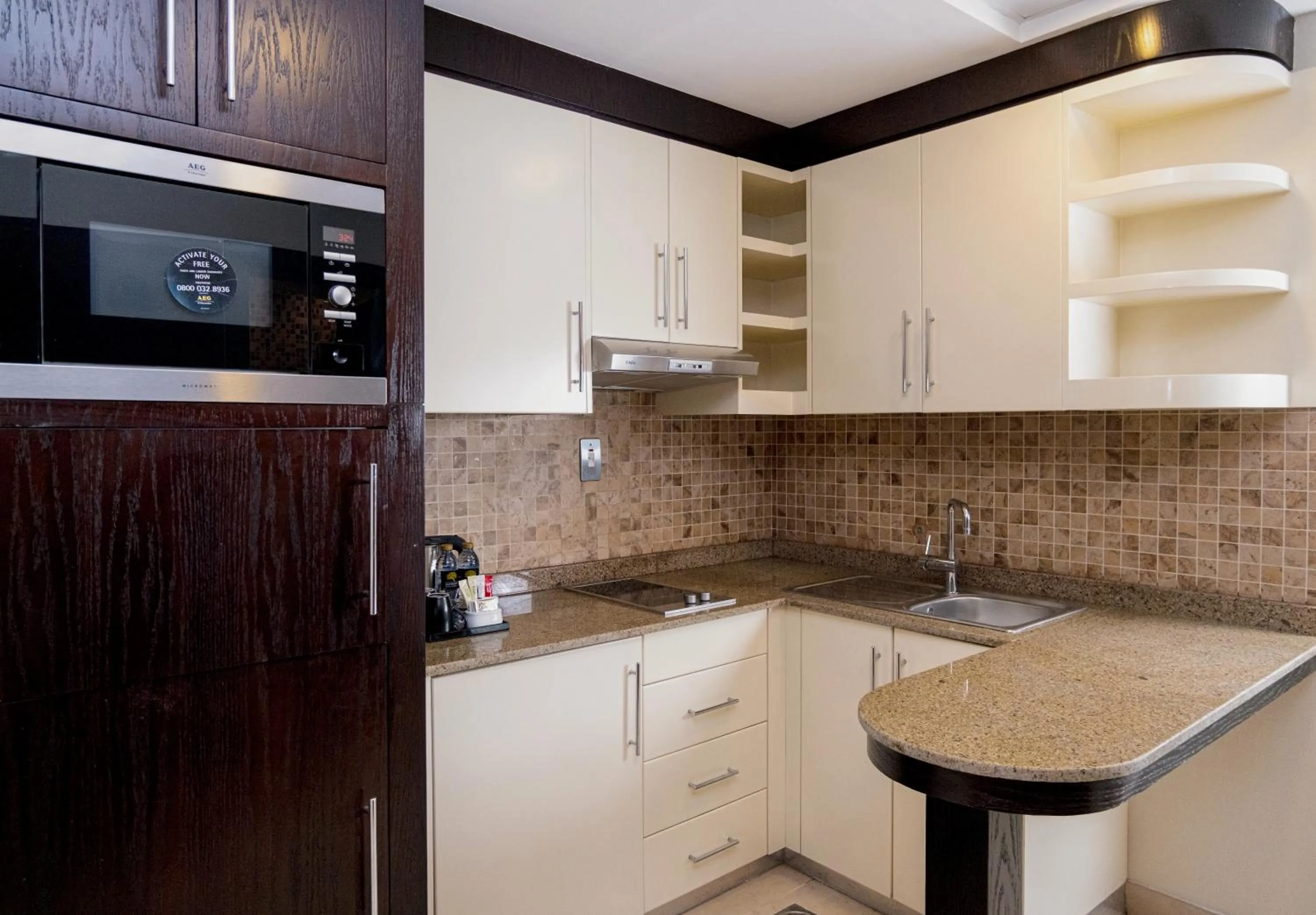 Kitchen or kitchenette in Jannah Executive Hotel Apartments