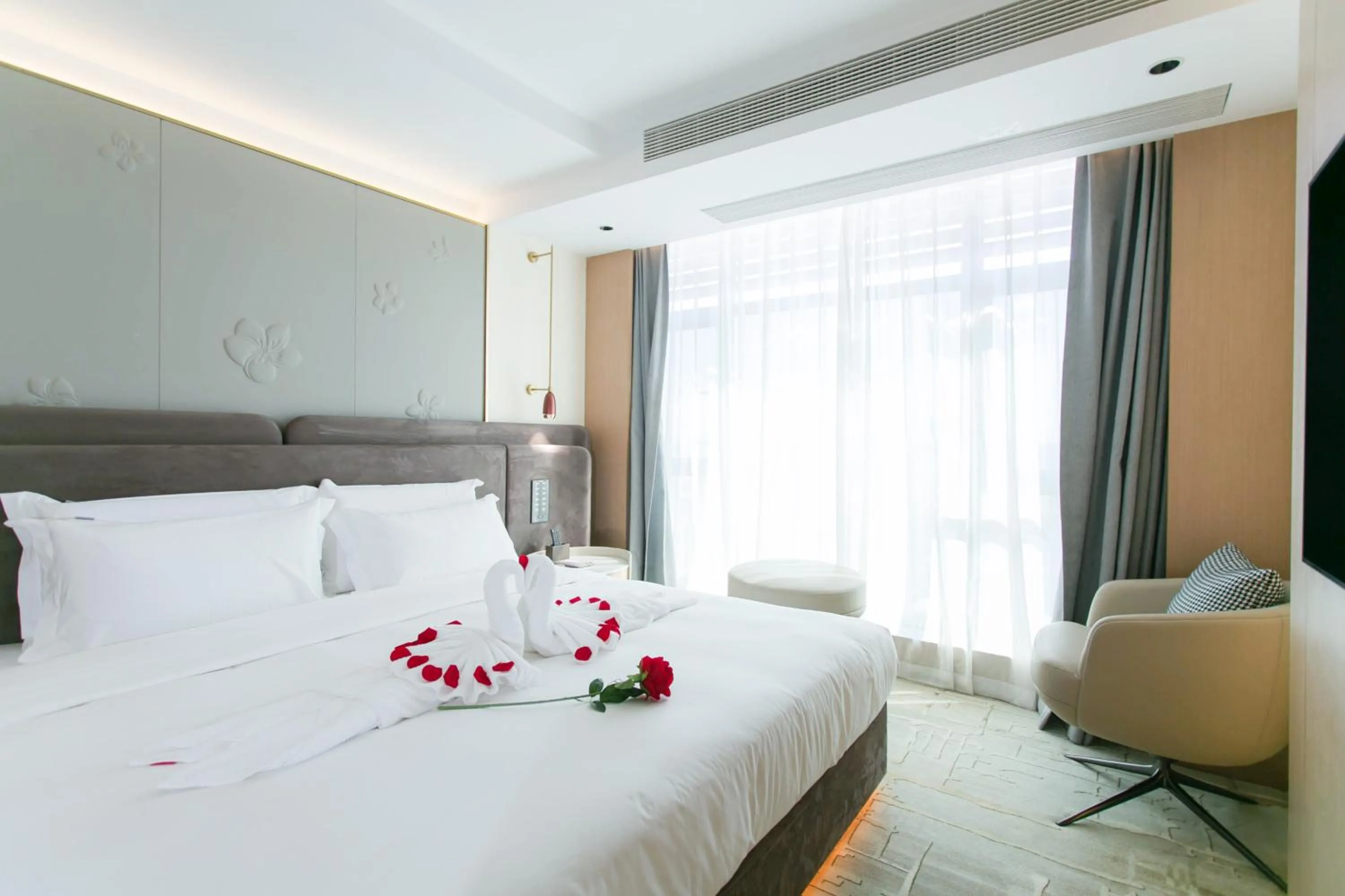 Bed in Ramada by Wyndham Vientiane Central
