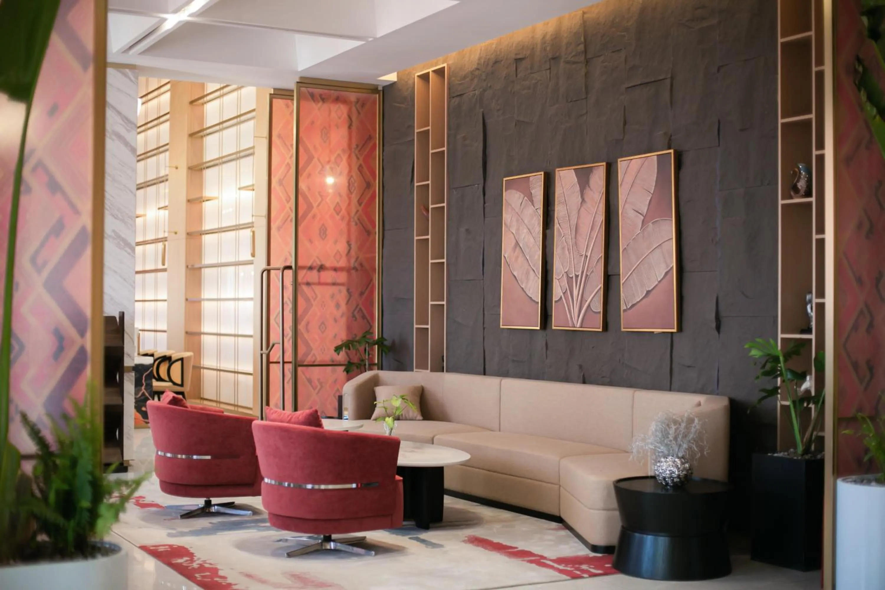 Communal lounge/ TV room in Ramada by Wyndham Vientiane Central