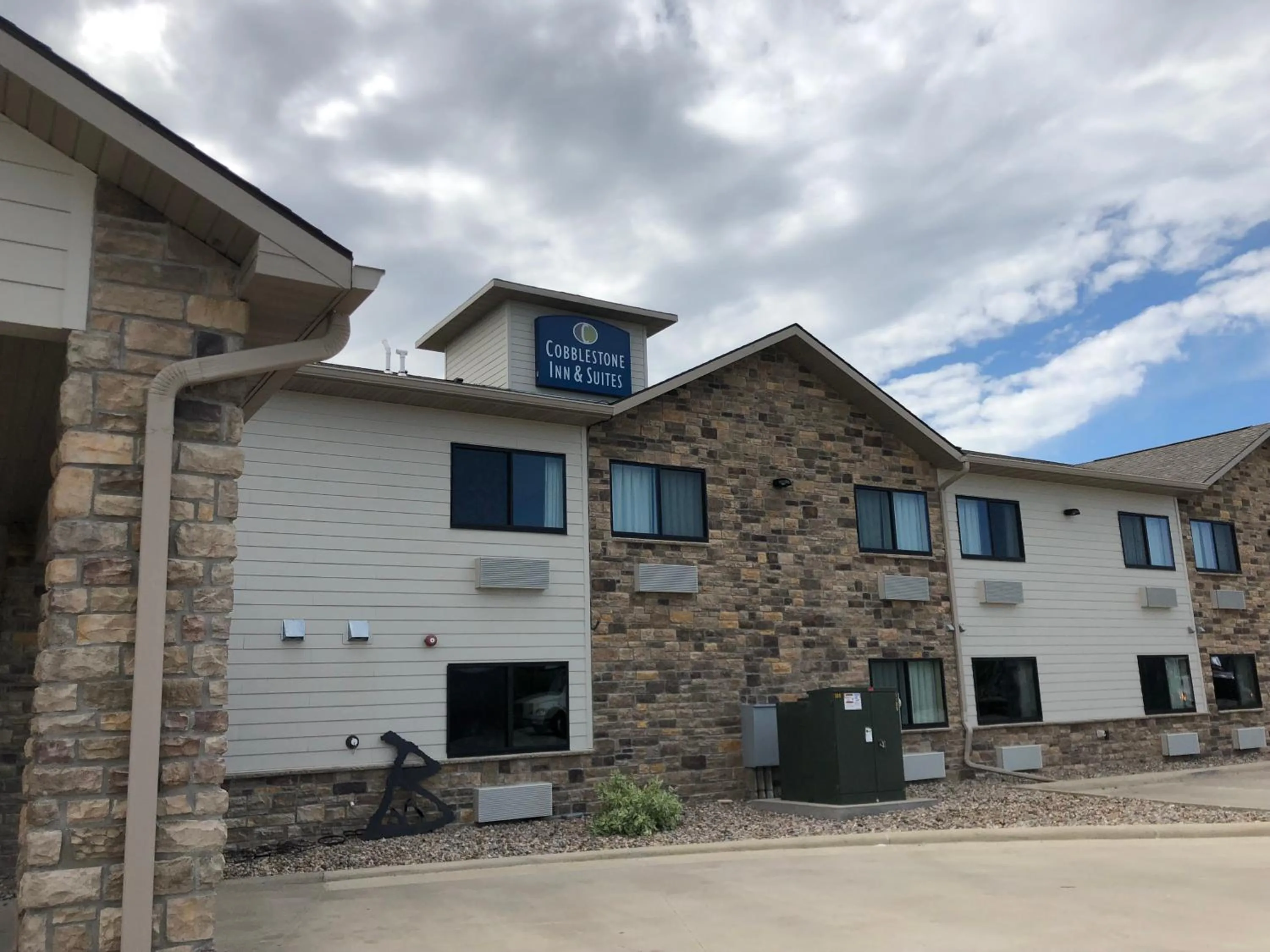 Property building in Cobblestone Inn & Suites - Denison | Oak Ridge