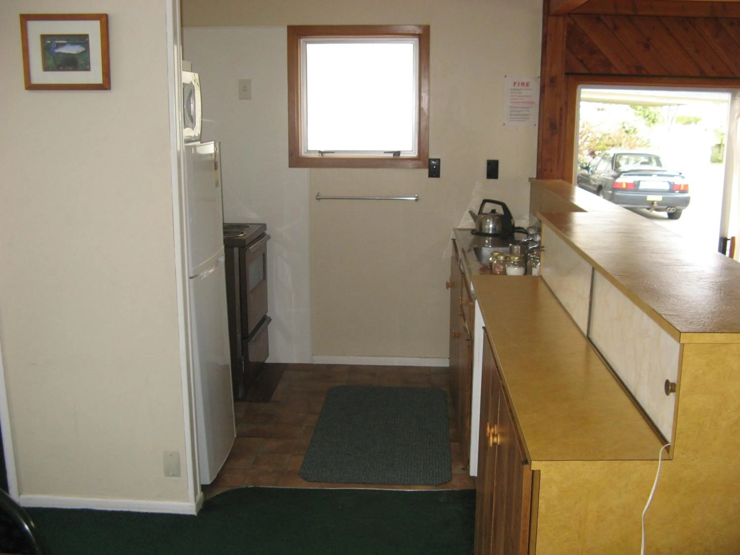 Kitchen or kitchenette in Tongariro River Motel